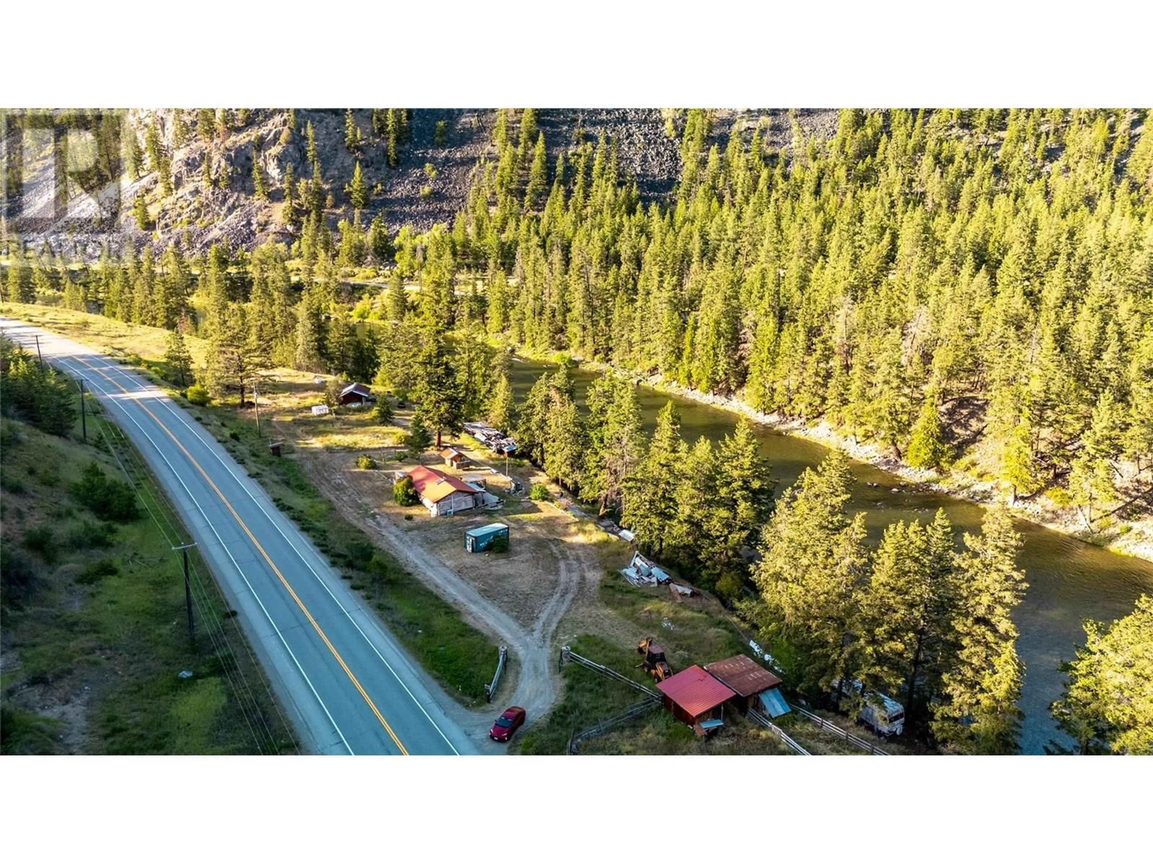 A pic from outside/outdoor area/front of a property/back of a property/a pic from drone, forest/trees view for 1840 HIGHWAY 3 OTHER, Princeton British Columbia V0X1W0