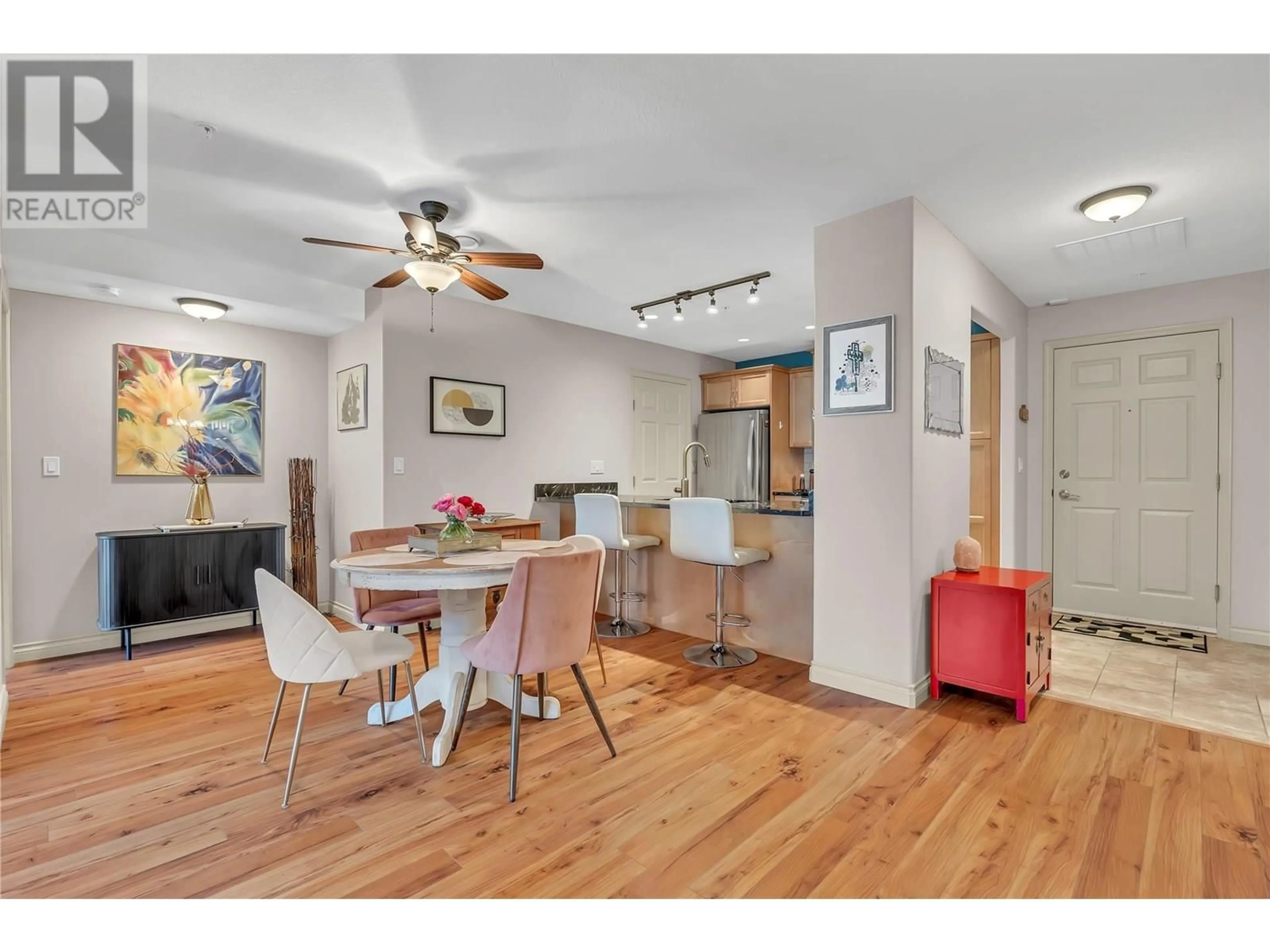Open concept kitchen, wood/laminate floor for 203 - 2113 ATKINSON STREET, Penticton British Columbia V2A8R5