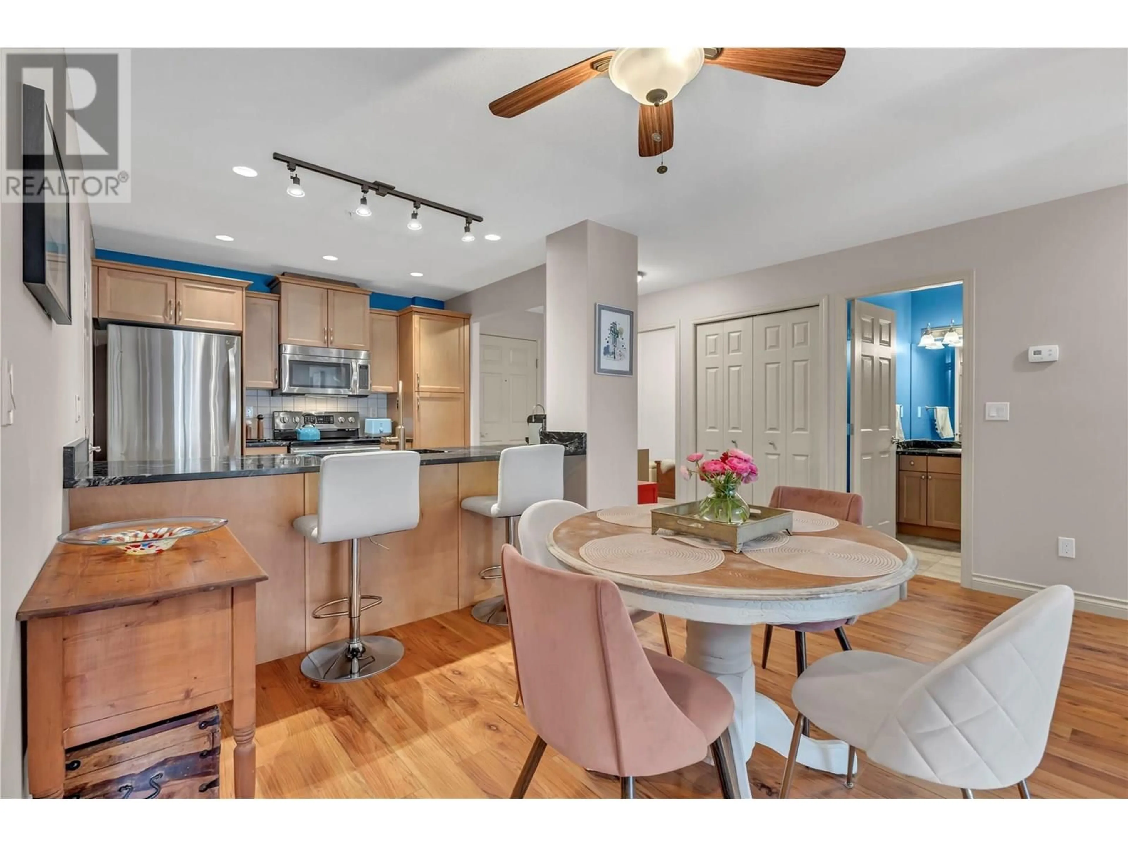 Open concept kitchen, wood/laminate floor for 203 - 2113 ATKINSON STREET, Penticton British Columbia V2A8R5