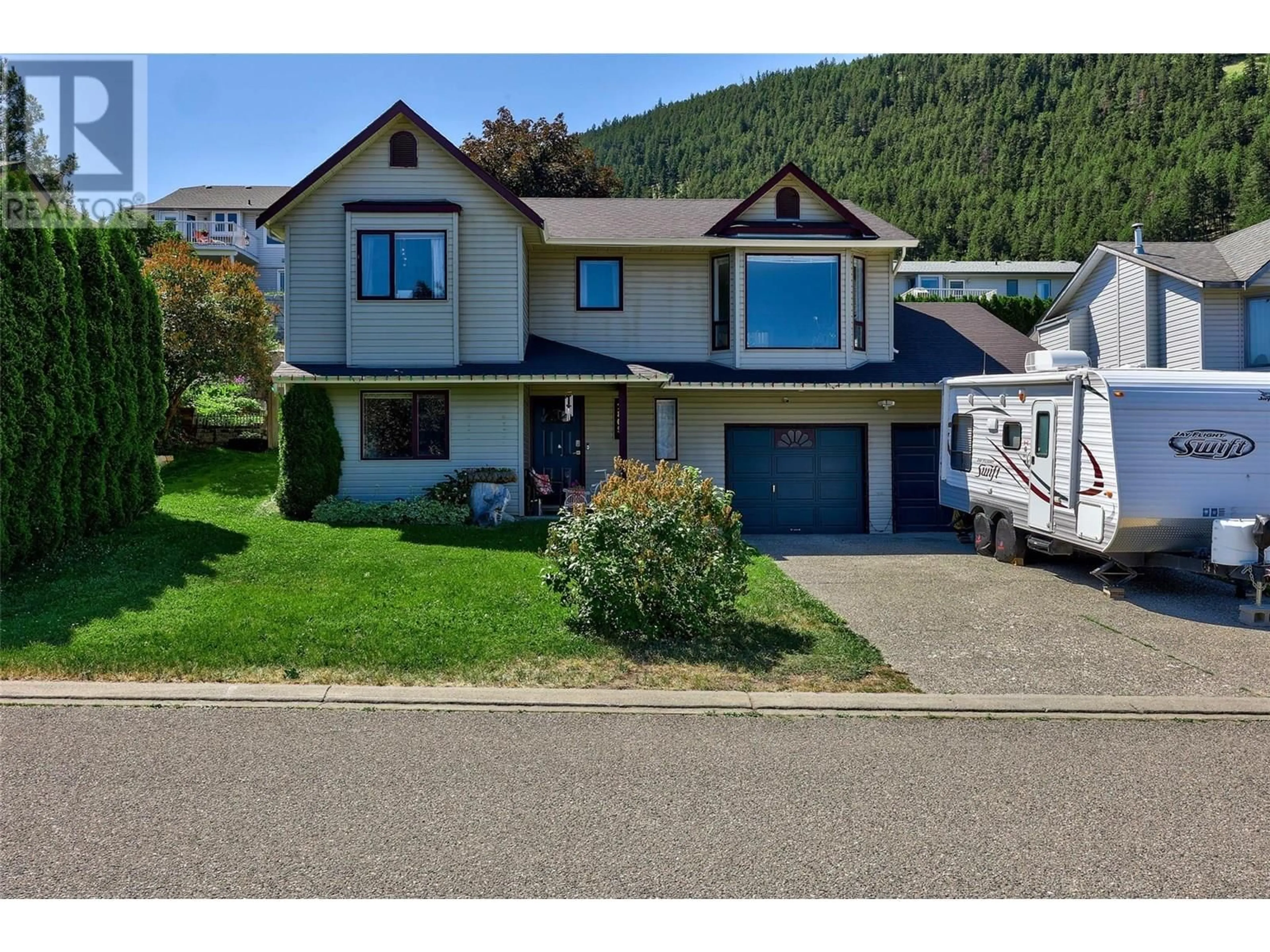 Home with vinyl exterior material, street for 2869 SQUAMISH COURT, Kamloops British Columbia V2E2K9