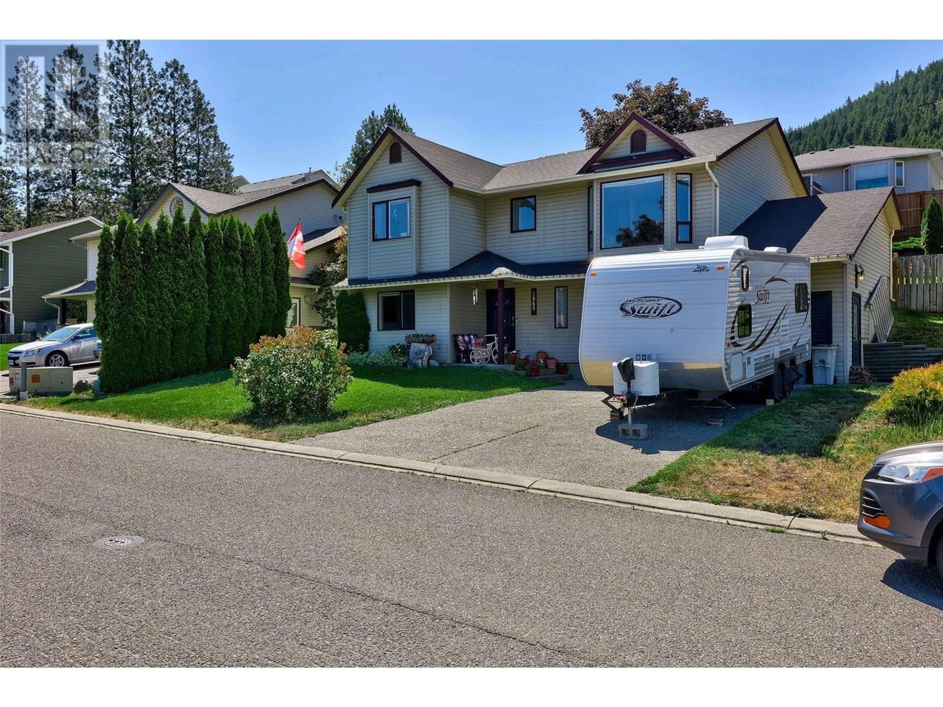 Home with vinyl exterior material, street for 2869 SQUAMISH COURT, Kamloops British Columbia V2E2K9
