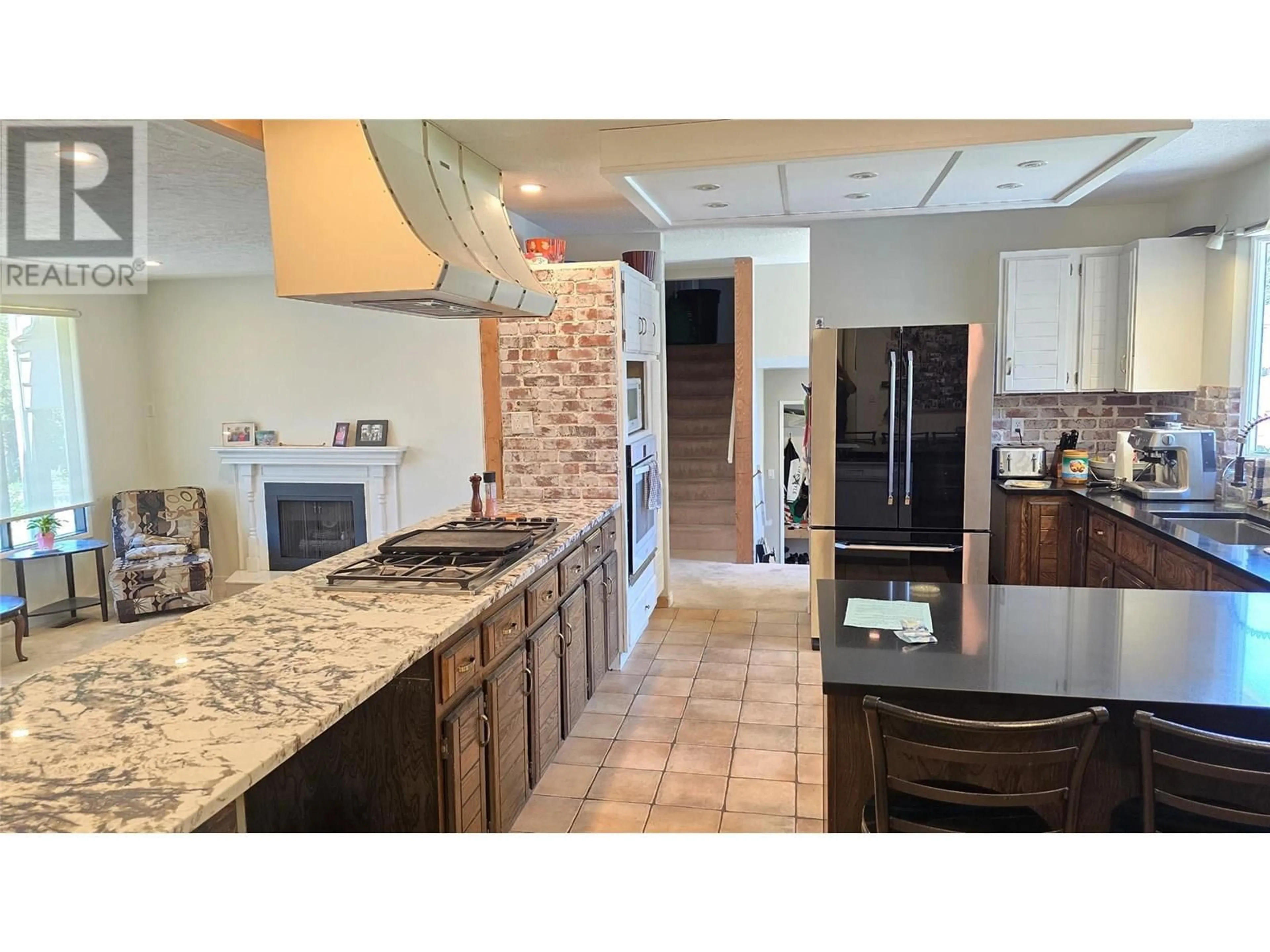 Open concept kitchen, ceramic/tile floor for 4355 FURIAK ROAD, Kamloops British Columbia V2H1L3