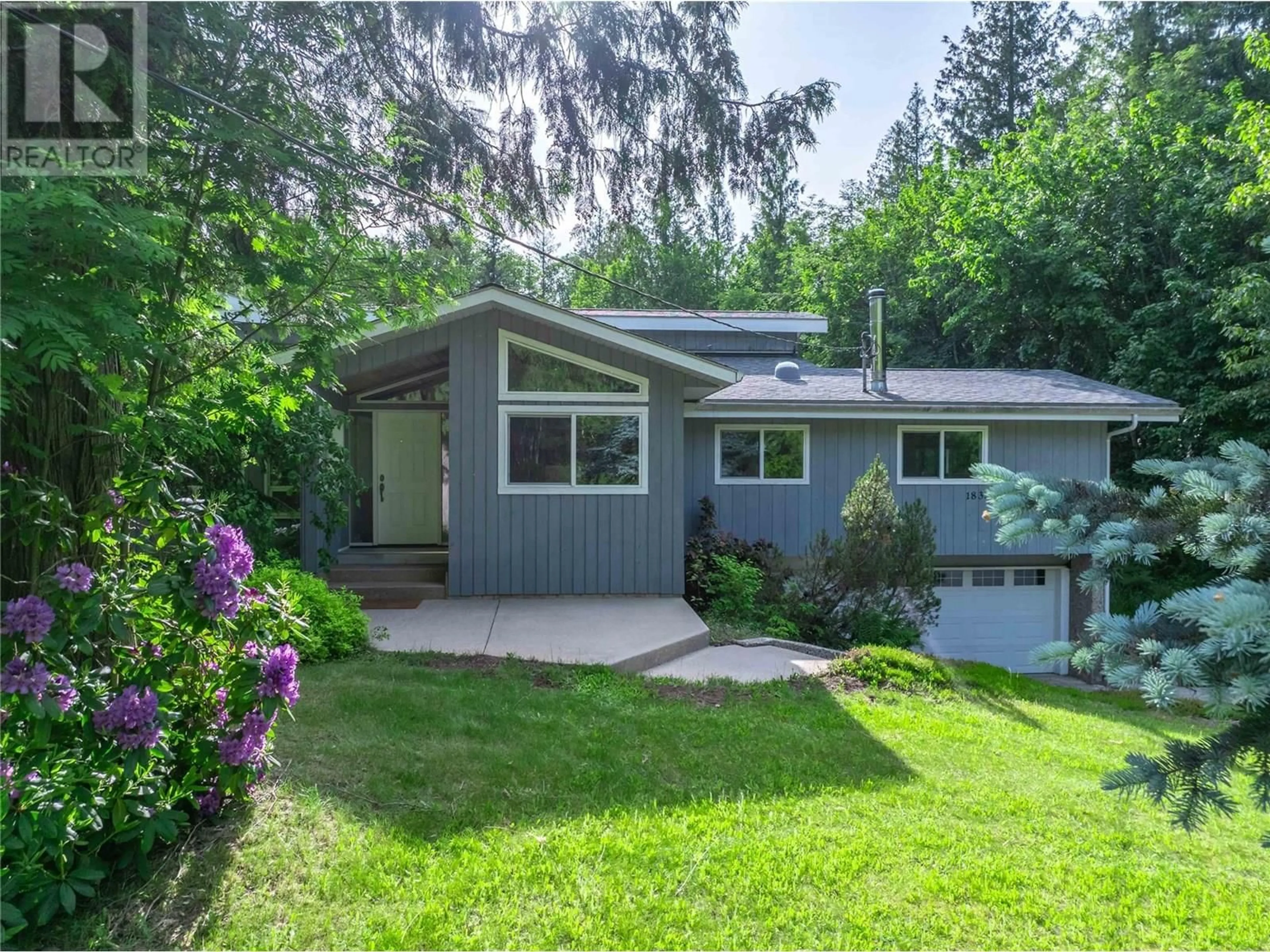 Home with vinyl exterior material, unknown for 1833 PARK DRIVE, Revelstoke British Columbia V0E2S1