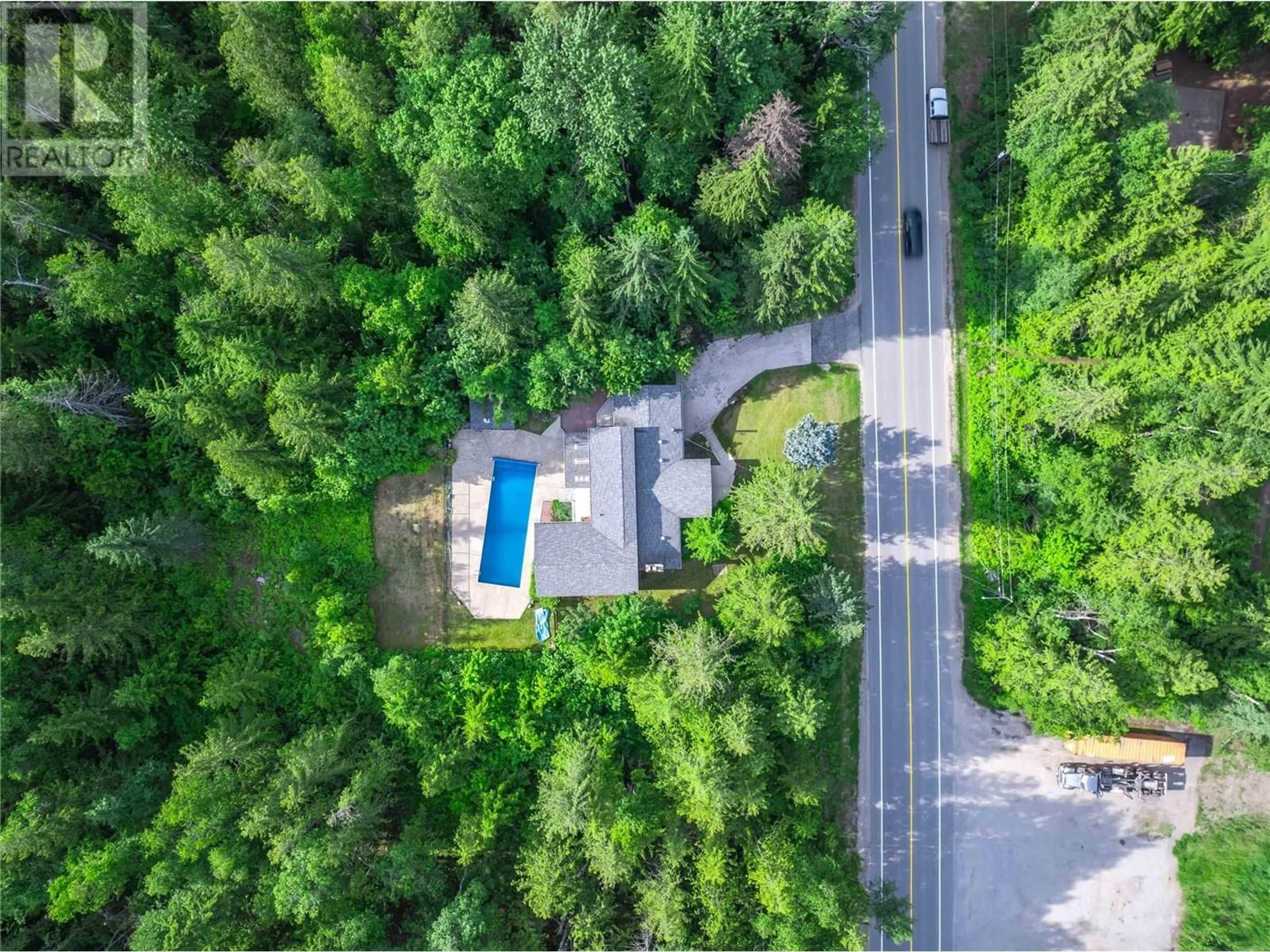 A pic from outside/outdoor area/front of a property/back of a property/a pic from drone, forest/trees view for 1833 PARK DRIVE, Revelstoke British Columbia V0E2S1