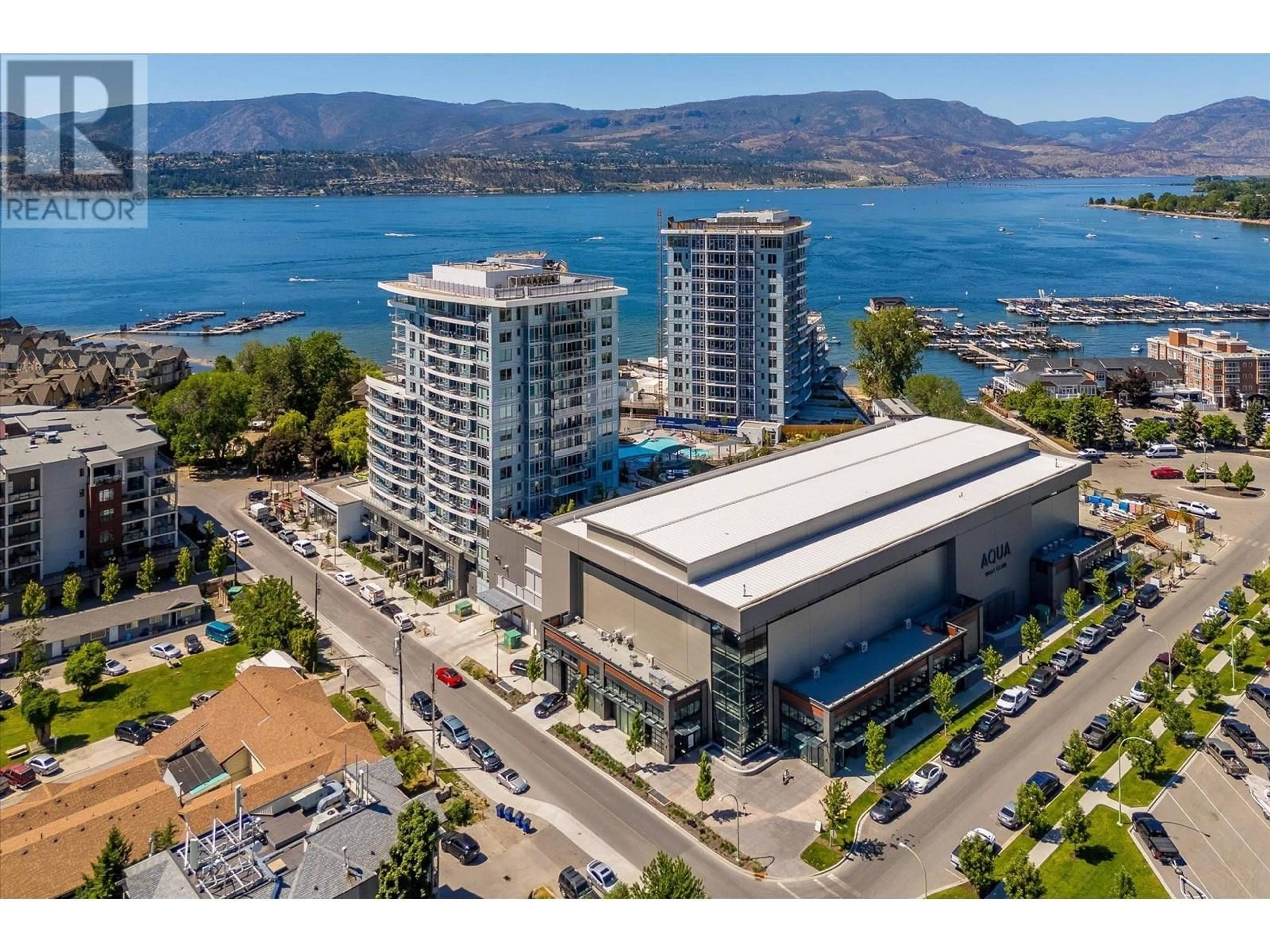 A pic from outside/outdoor area/front of a property/back of a property/a pic from drone, water/lake/river/ocean view for 512 - 3699 CAPOZZI ROAD, Kelowna British Columbia V1W3L2