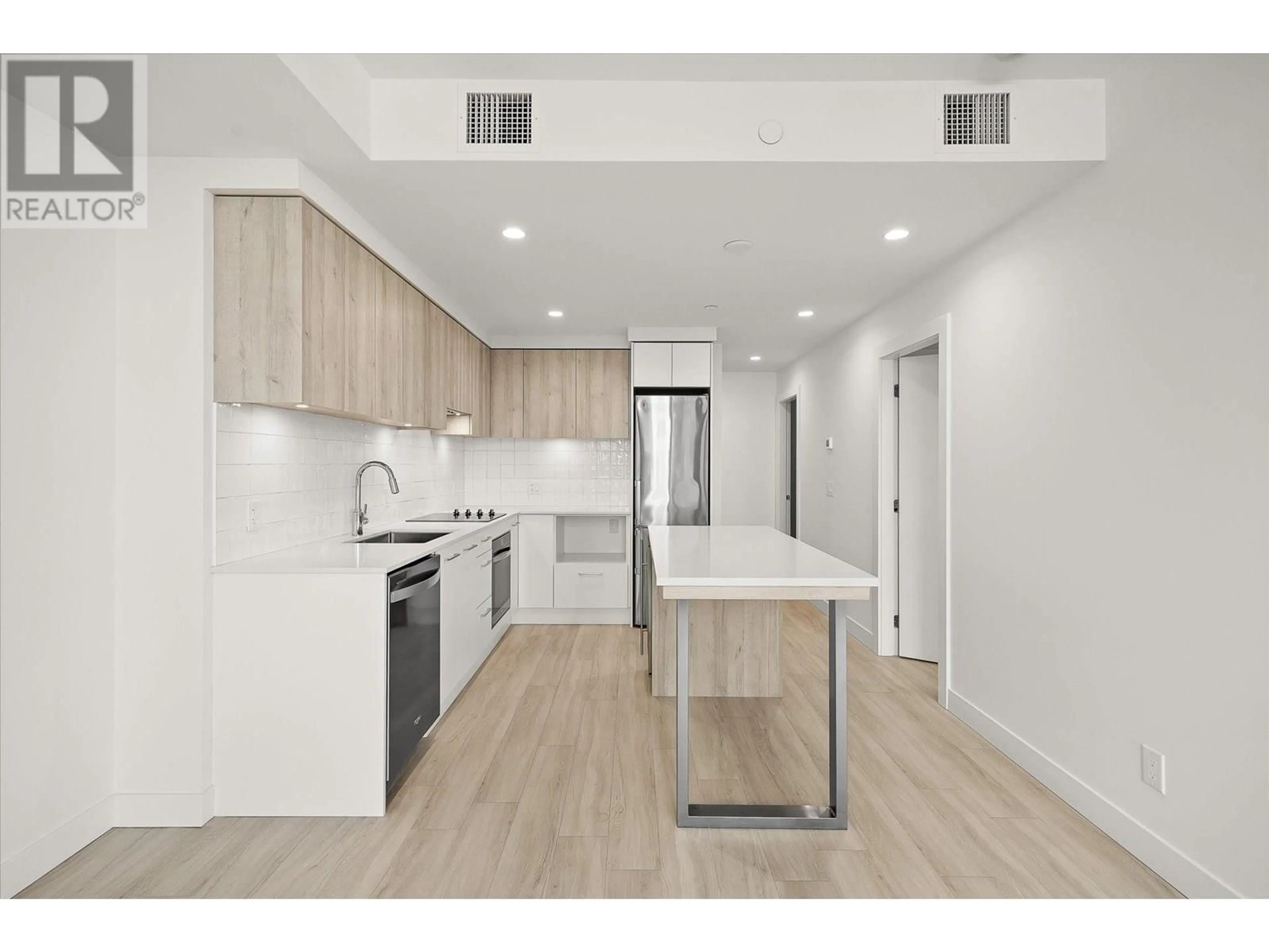 Open concept kitchen, unknown for 512 - 3699 CAPOZZI ROAD, Kelowna British Columbia V1W3L2