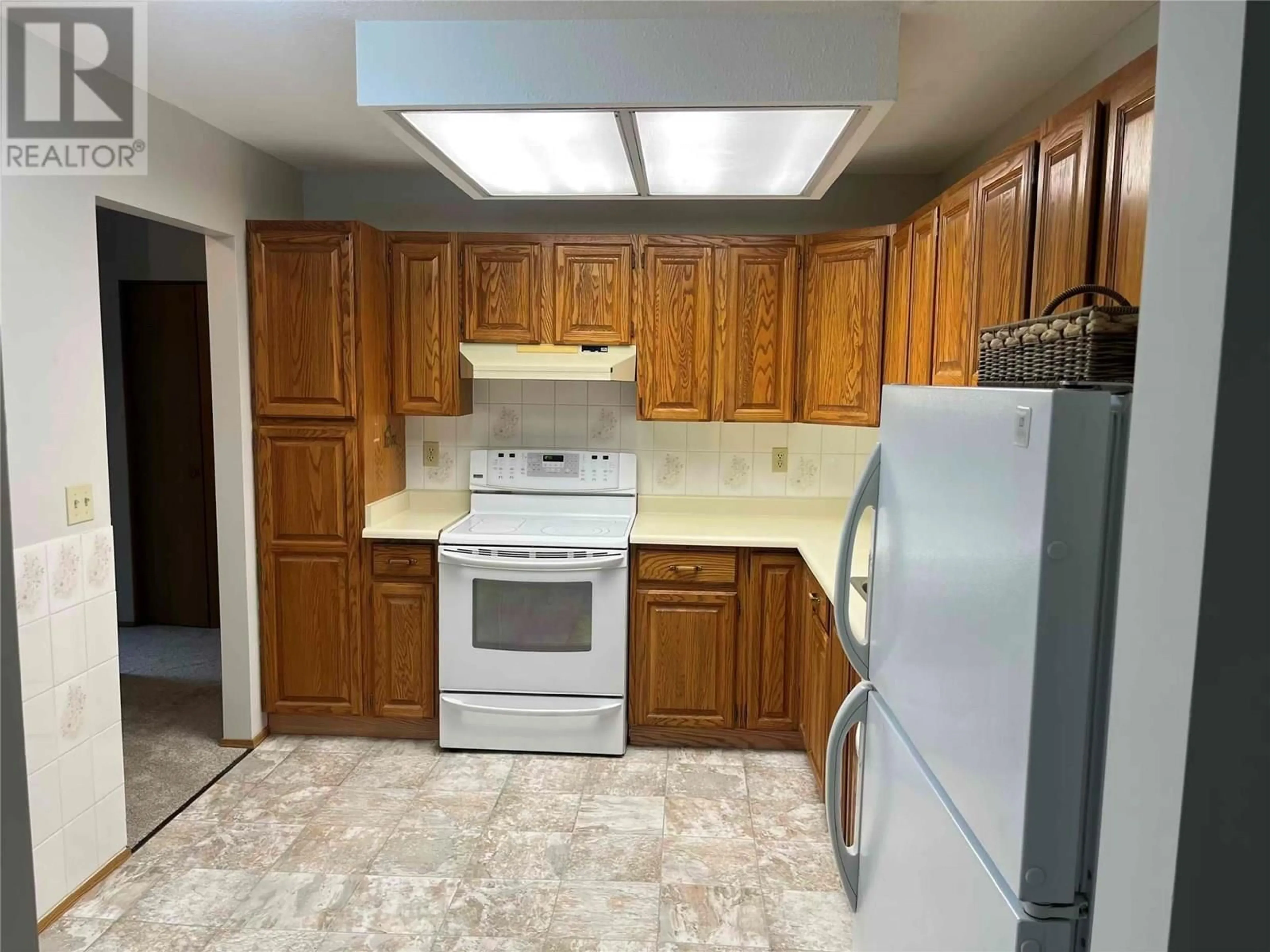 Standard kitchen, unknown for 104 - 1055 GLENWOOD AVENUE, Kelowna British Columbia V1Y5M8