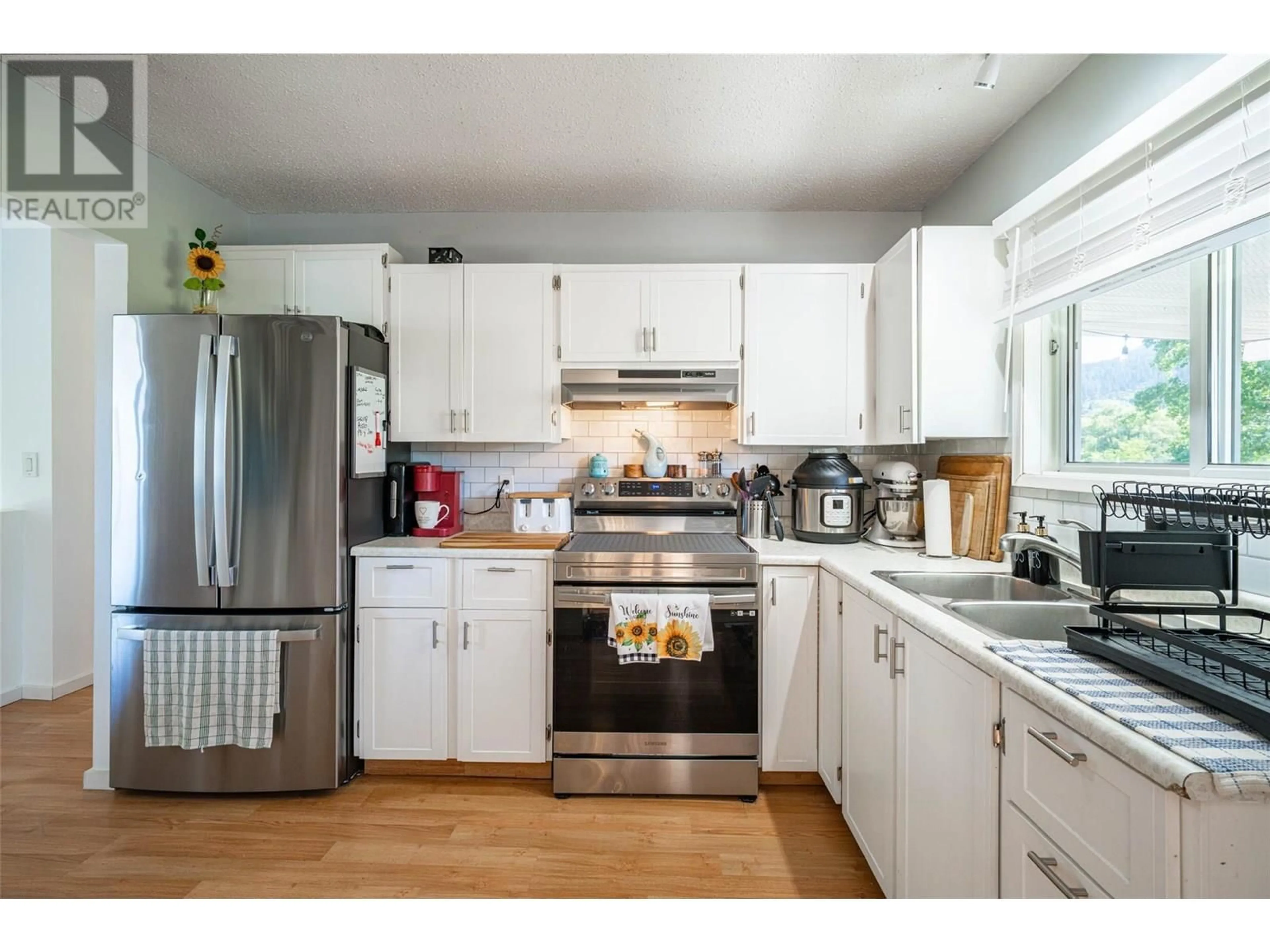 Standard kitchen, wood/laminate floor for 1859 EAST VERNON ROAD, Vernon British Columbia V1B3A7
