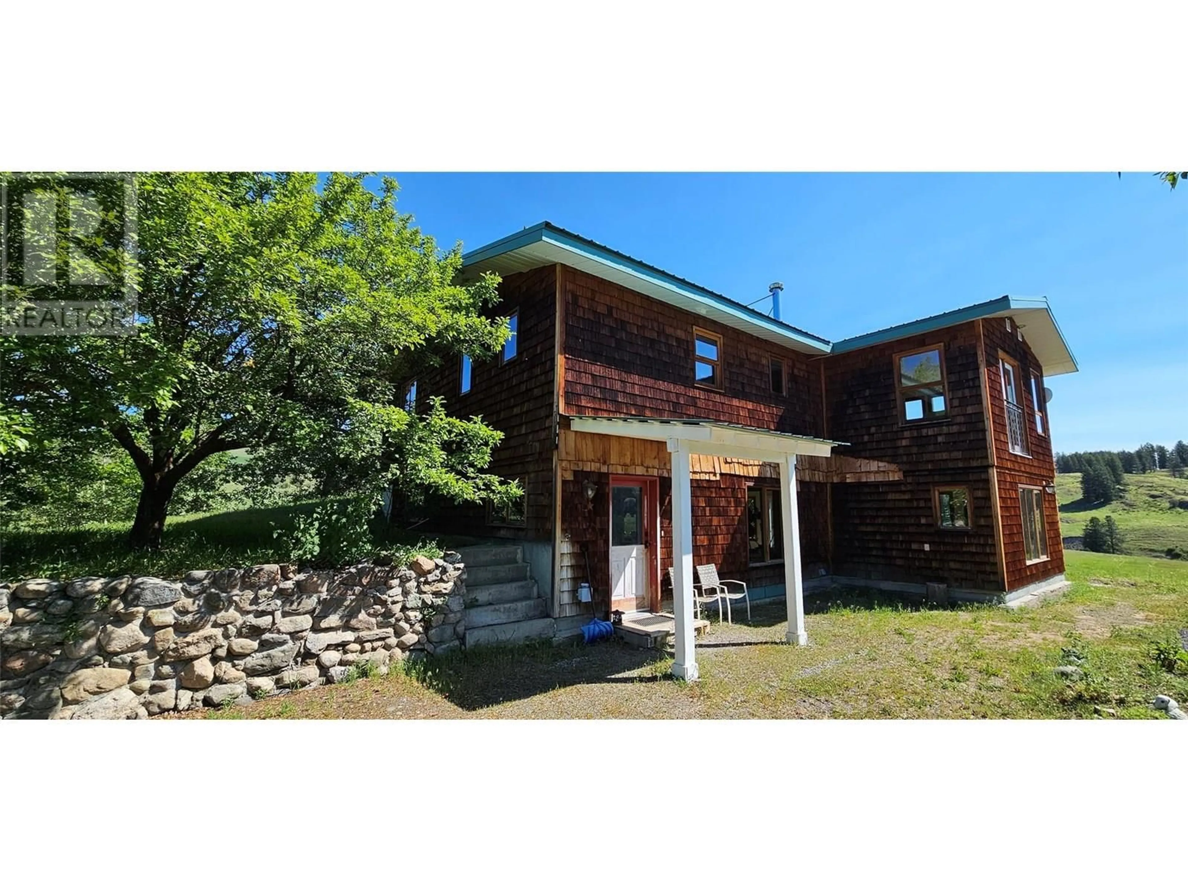 A pic from outside/outdoor area/front of a property/back of a property/a pic from drone, building for 4690 HWY 3 OTHER, Rock Creek British Columbia V0H1Y0