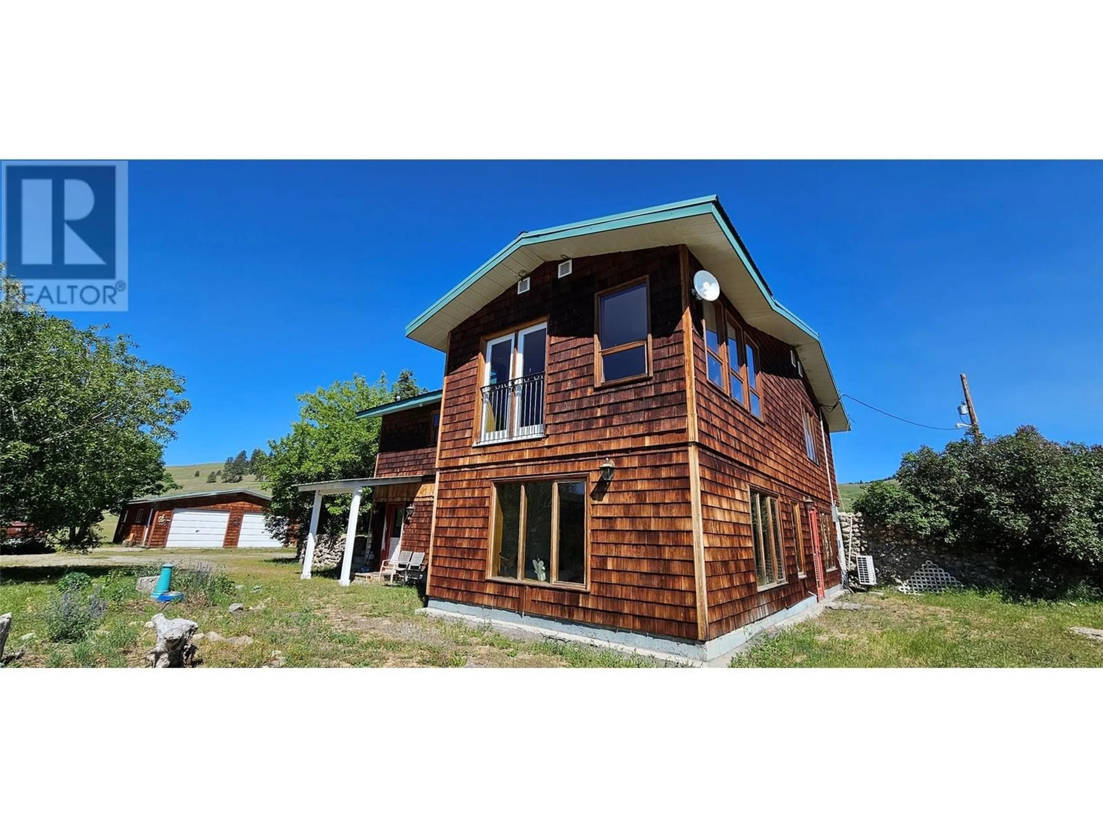 A pic from outside/outdoor area/front of a property/back of a property/a pic from drone, building for 4690 HWY 3 OTHER, Rock Creek British Columbia V0H1Y0