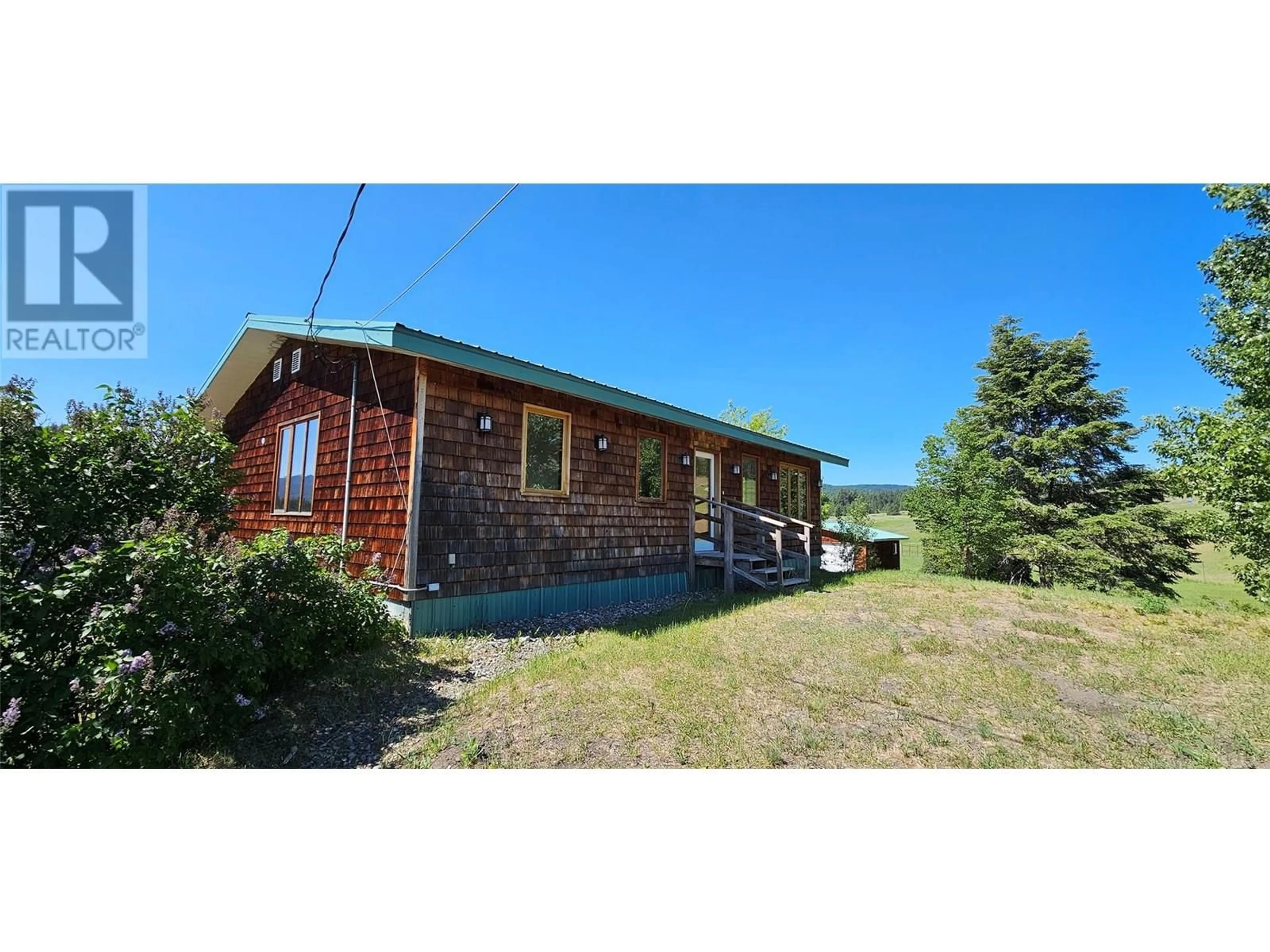 A pic from outside/outdoor area/front of a property/back of a property/a pic from drone, building for 4690 HWY 3 OTHER, Rock Creek British Columbia V0H1Y0