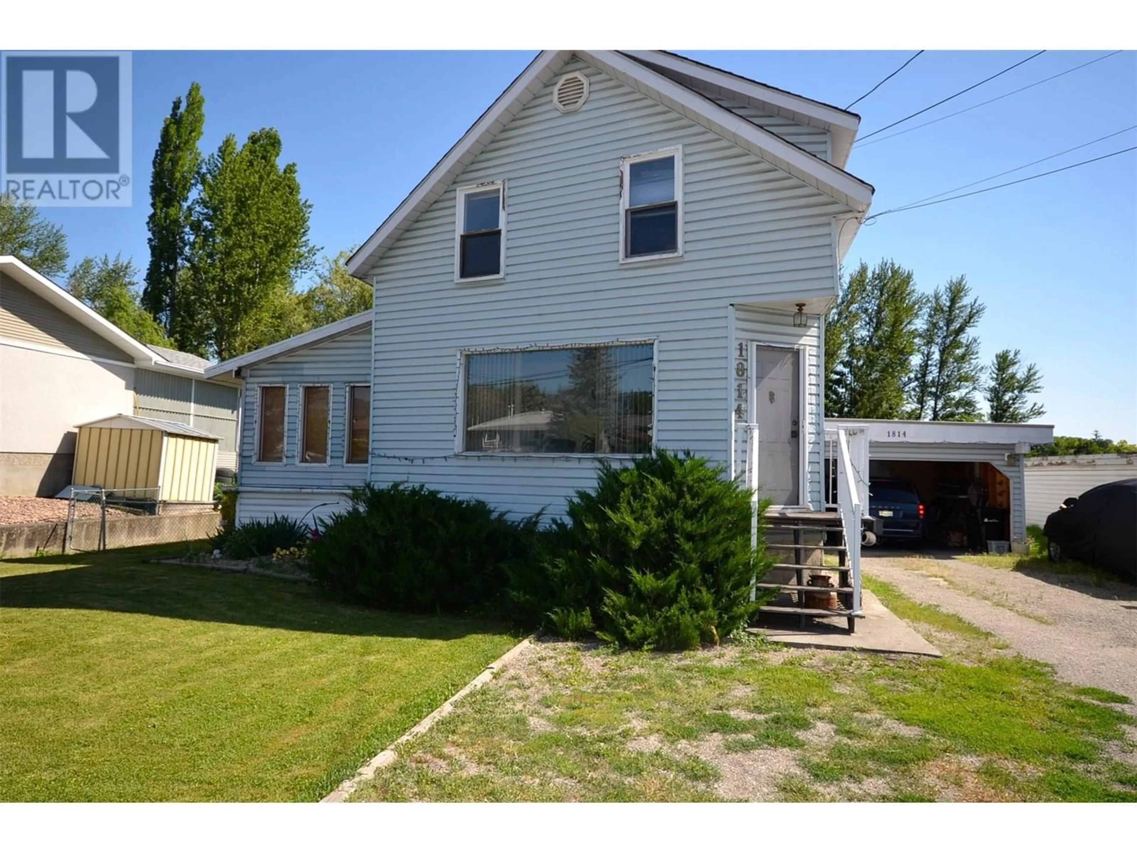 Home with vinyl exterior material, street for 1814 43 AVENUE, Vernon British Columbia V1T3K3