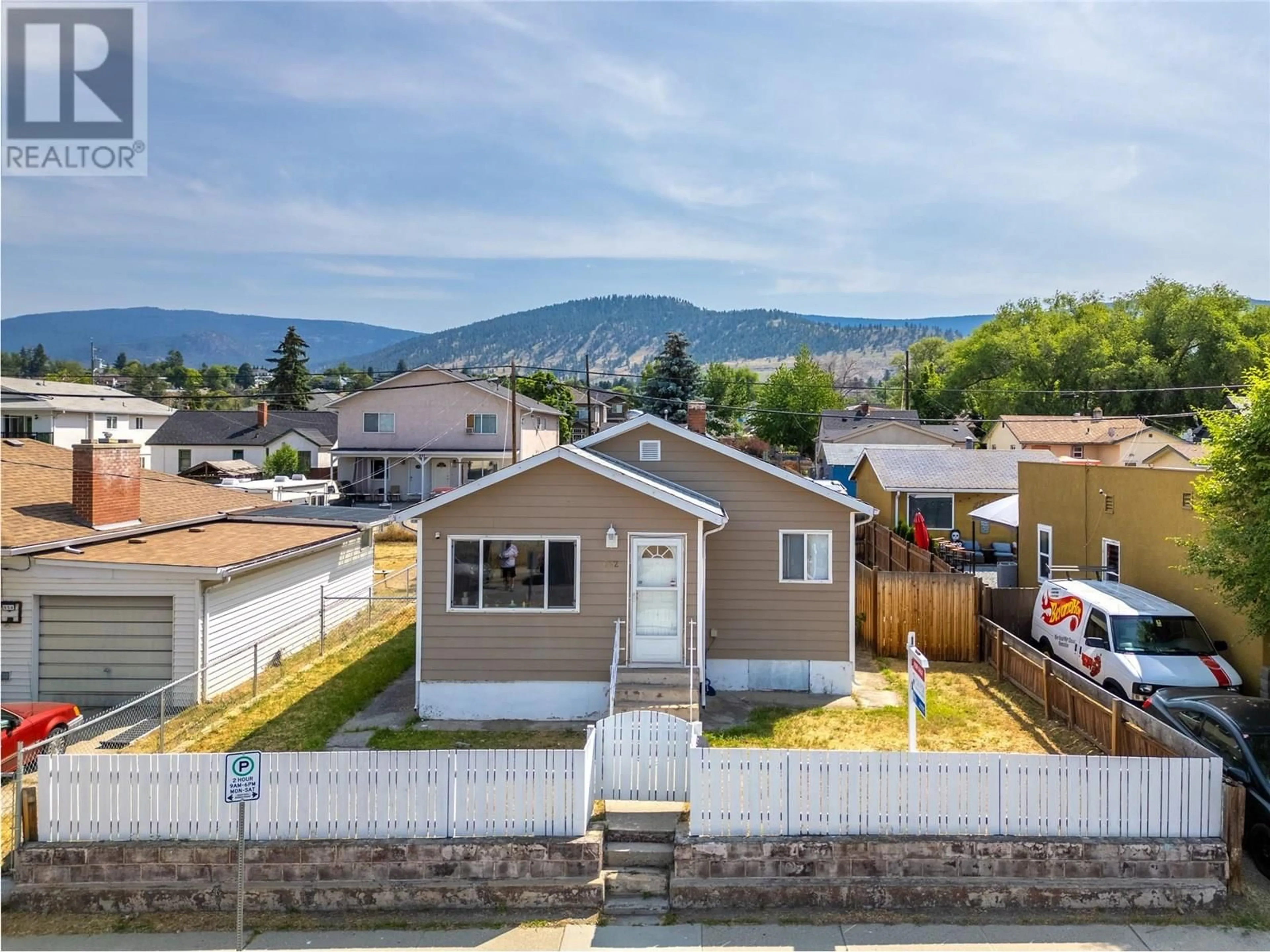 A pic from outside/outdoor area/front of a property/back of a property/a pic from drone, mountain view for 662 ELLIS STREET, Penticton British Columbia V2A4M6