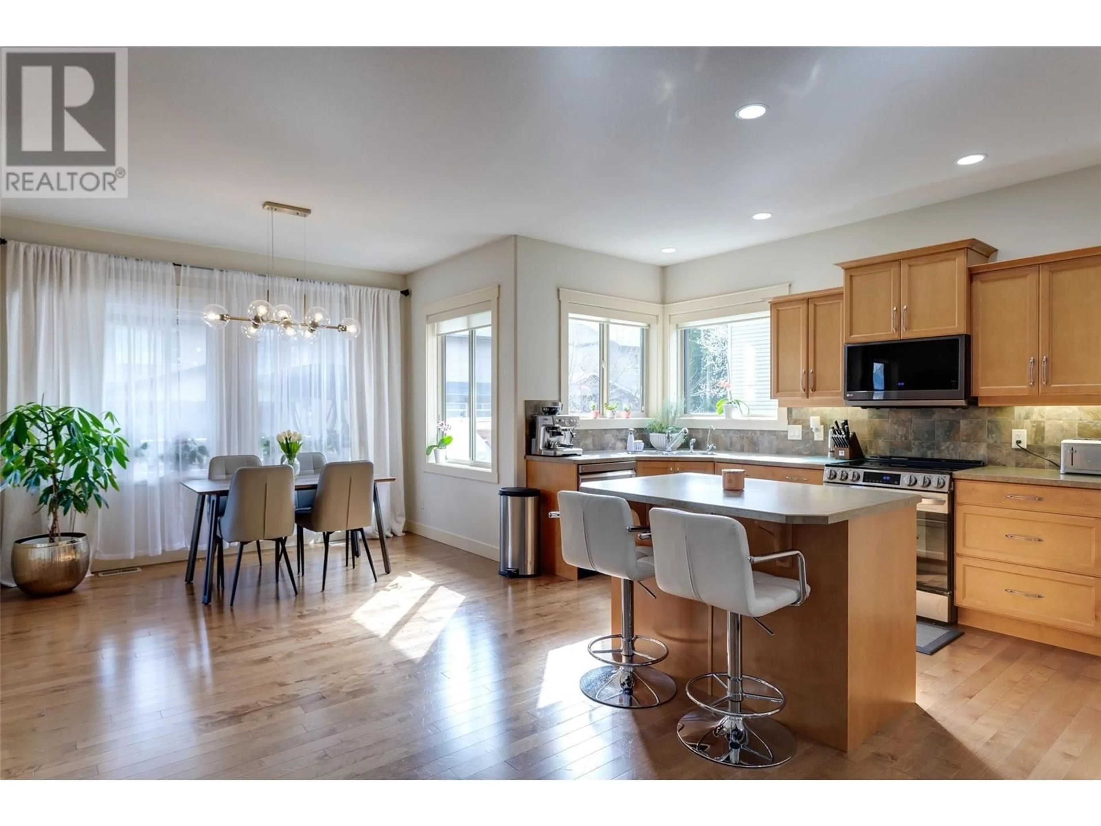 Open concept kitchen, wood/laminate floor for 2841 BENTLEY ROAD, West Kelowna British Columbia V4T3B2