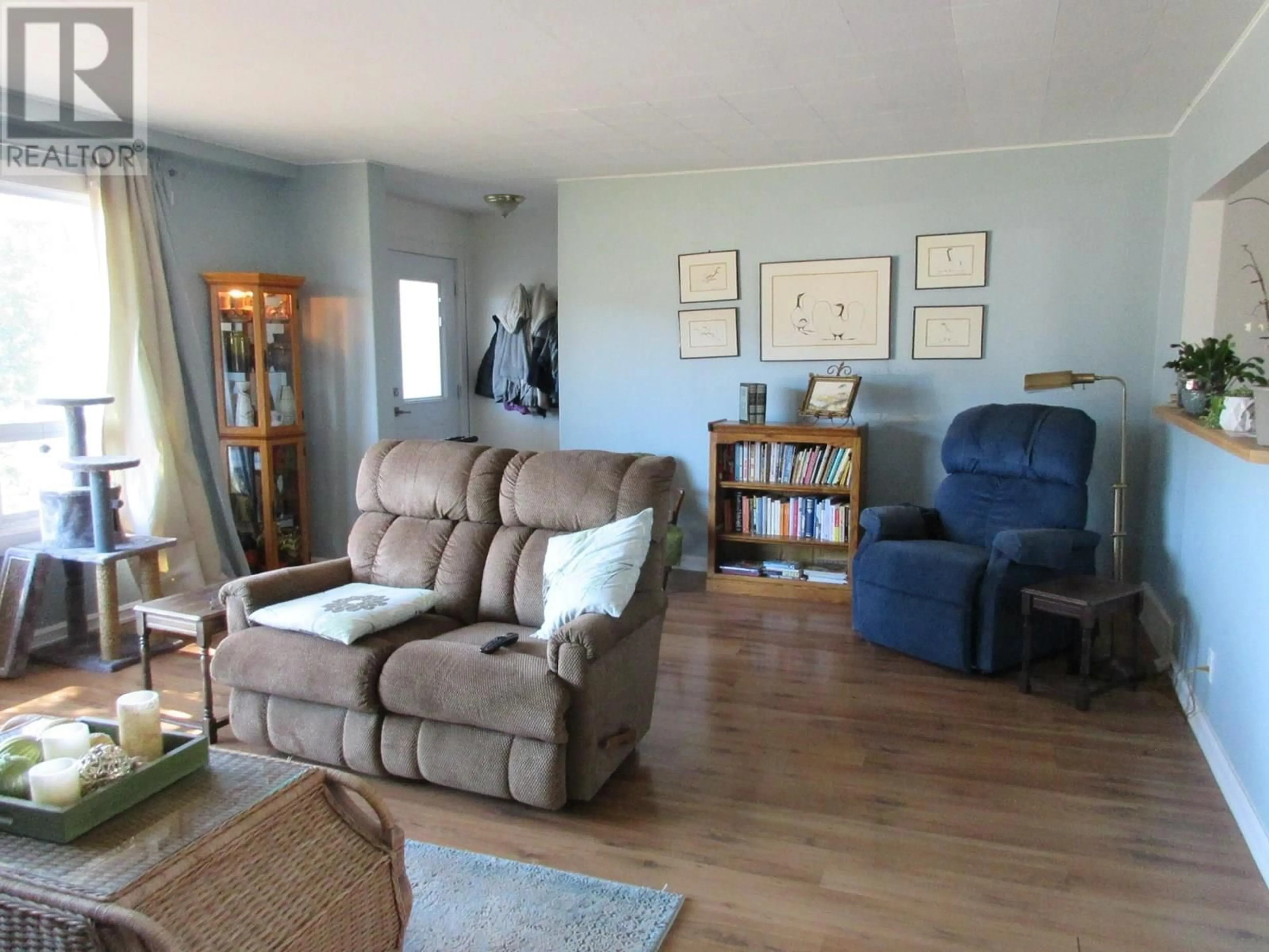 Living room with furniture, unknown for 2563 COUTLEE AVENUE, Merritt British Columbia V1K1B8
