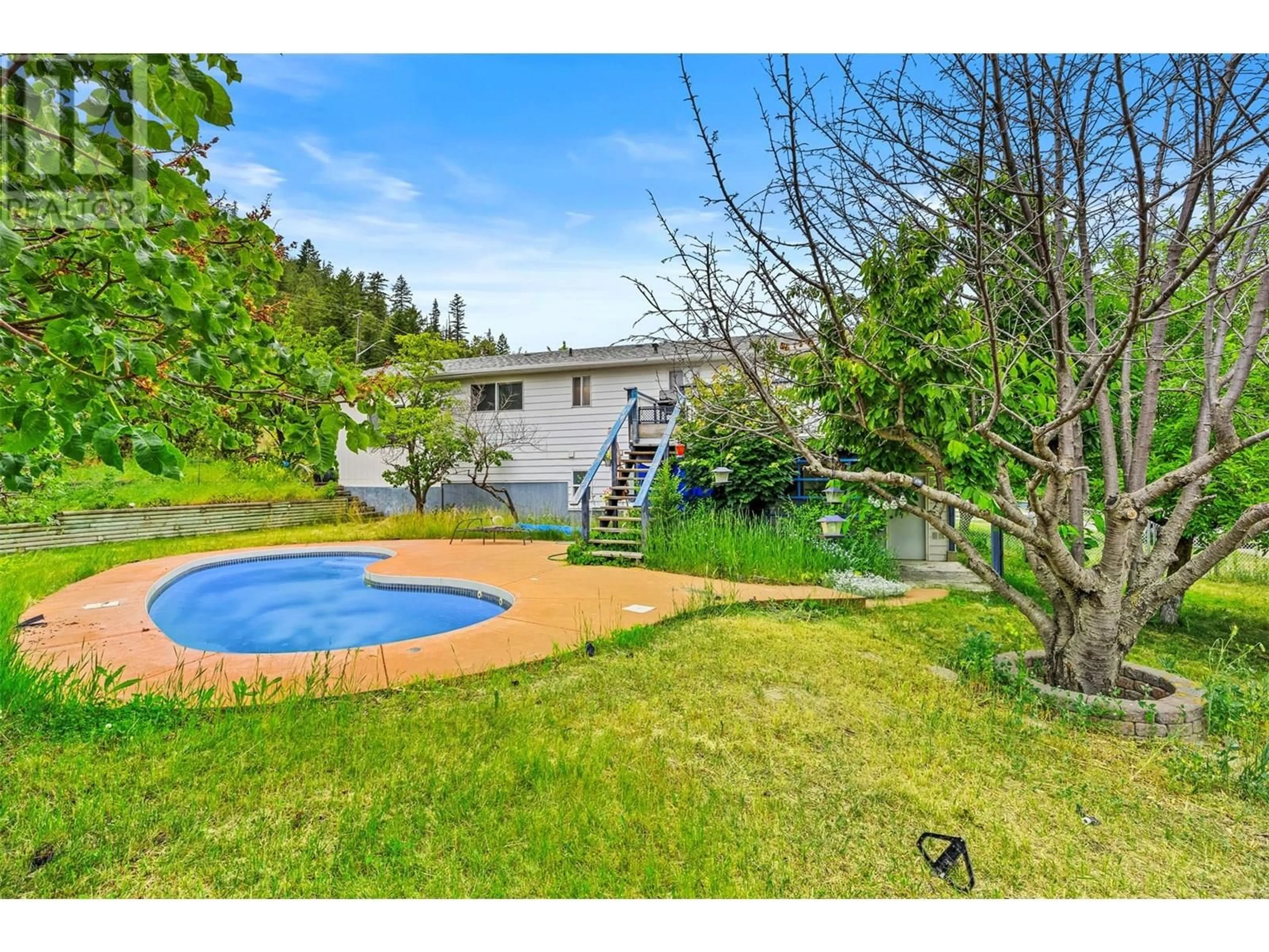 A pic from outside/outdoor area/front of a property/back of a property/a pic from drone, water/lake/river/ocean view for 906 KLAHANIE DRIVE, Kamloops British Columbia V2C5R2