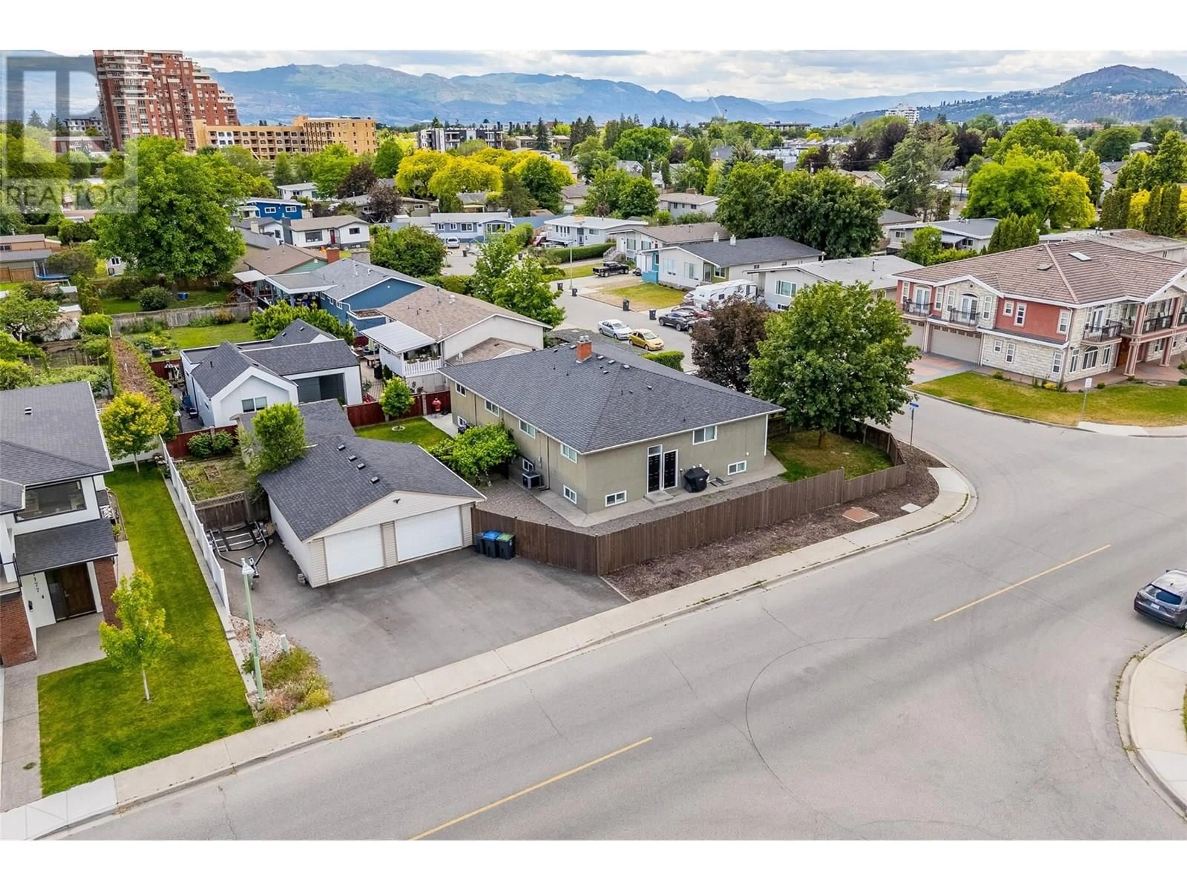 A pic from outside/outdoor area/front of a property/back of a property/a pic from drone, mountain view for 1397 ALDER COURT, Kelowna British Columbia V1Y3R1