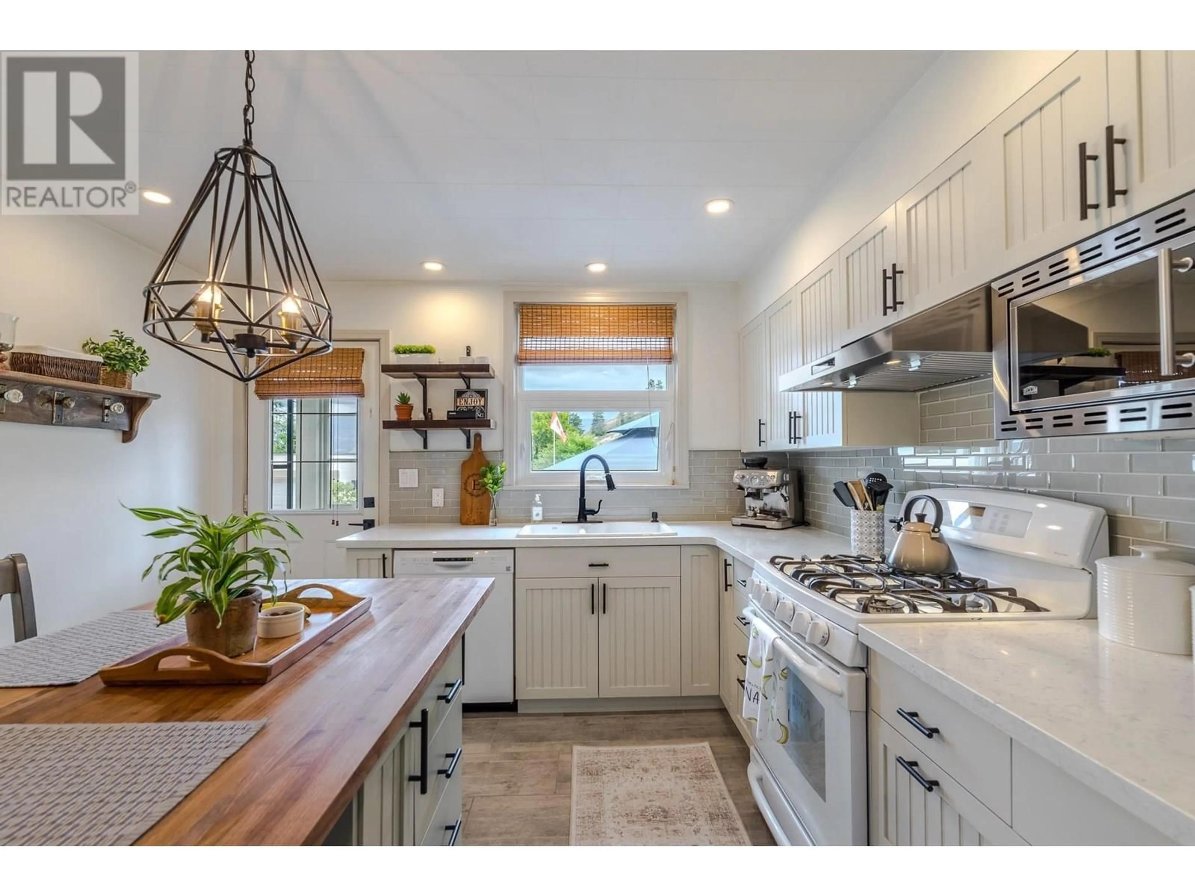 Open concept kitchen, ceramic/tile floor for 12411 VICTORIA ROAD SOUTH, Summerland British Columbia V0H1Z2