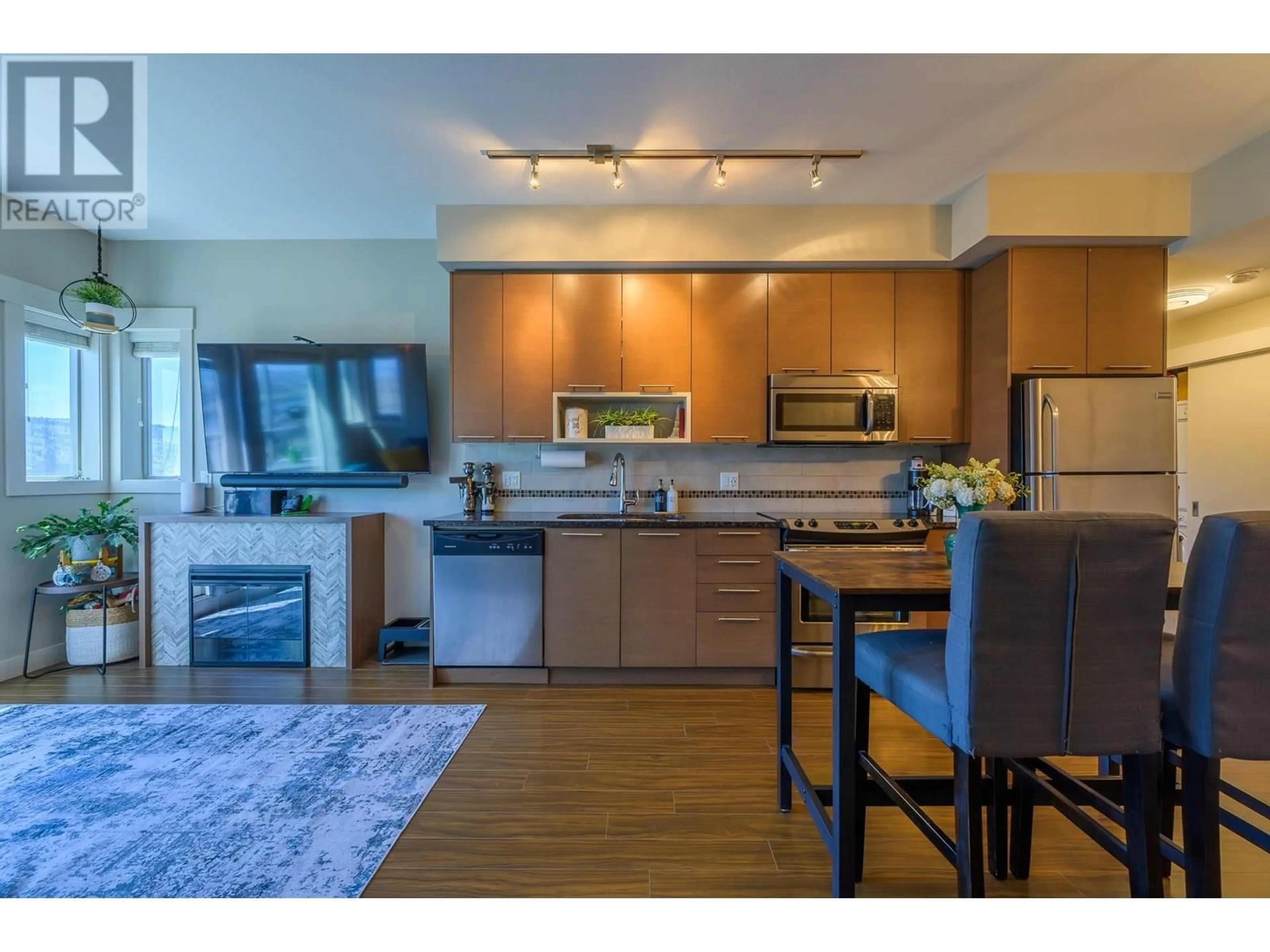 Open concept kitchen, wood/laminate floor for 3410 - 1040 TALASA WAY, Kamloops British Columbia V2H0C4