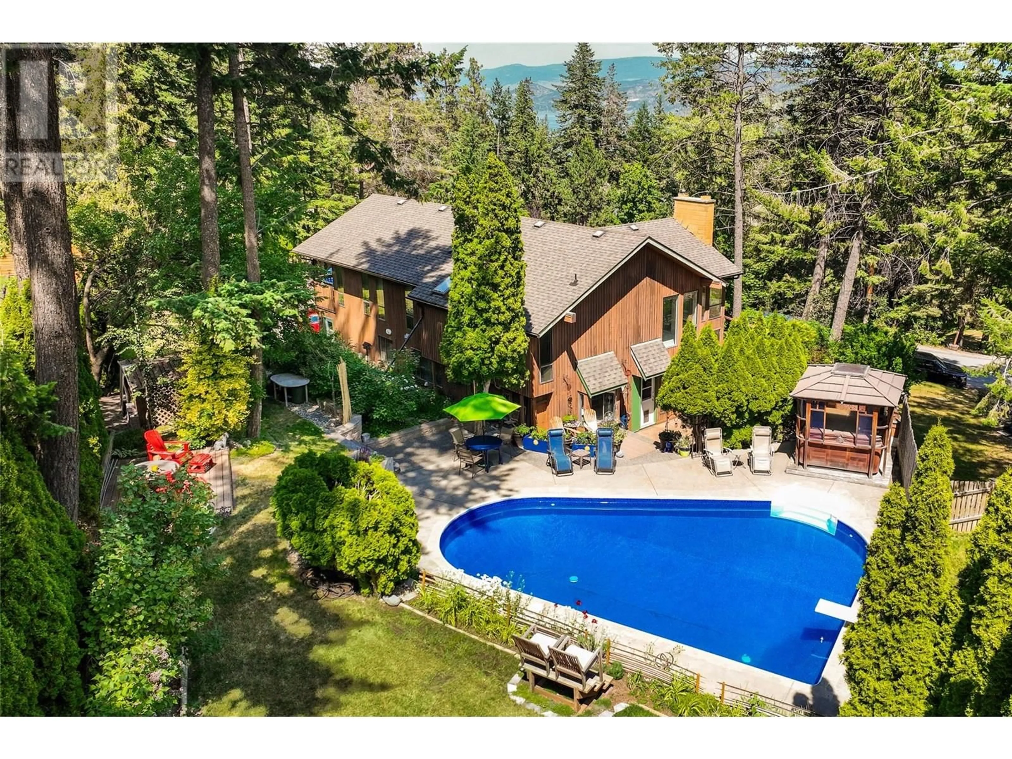 A pic from outside/outdoor area/front of a property/back of a property/a pic from drone, water/lake/river/ocean view for 1584 PARKINSON ROAD, West Kelowna British Columbia V1Z2X2