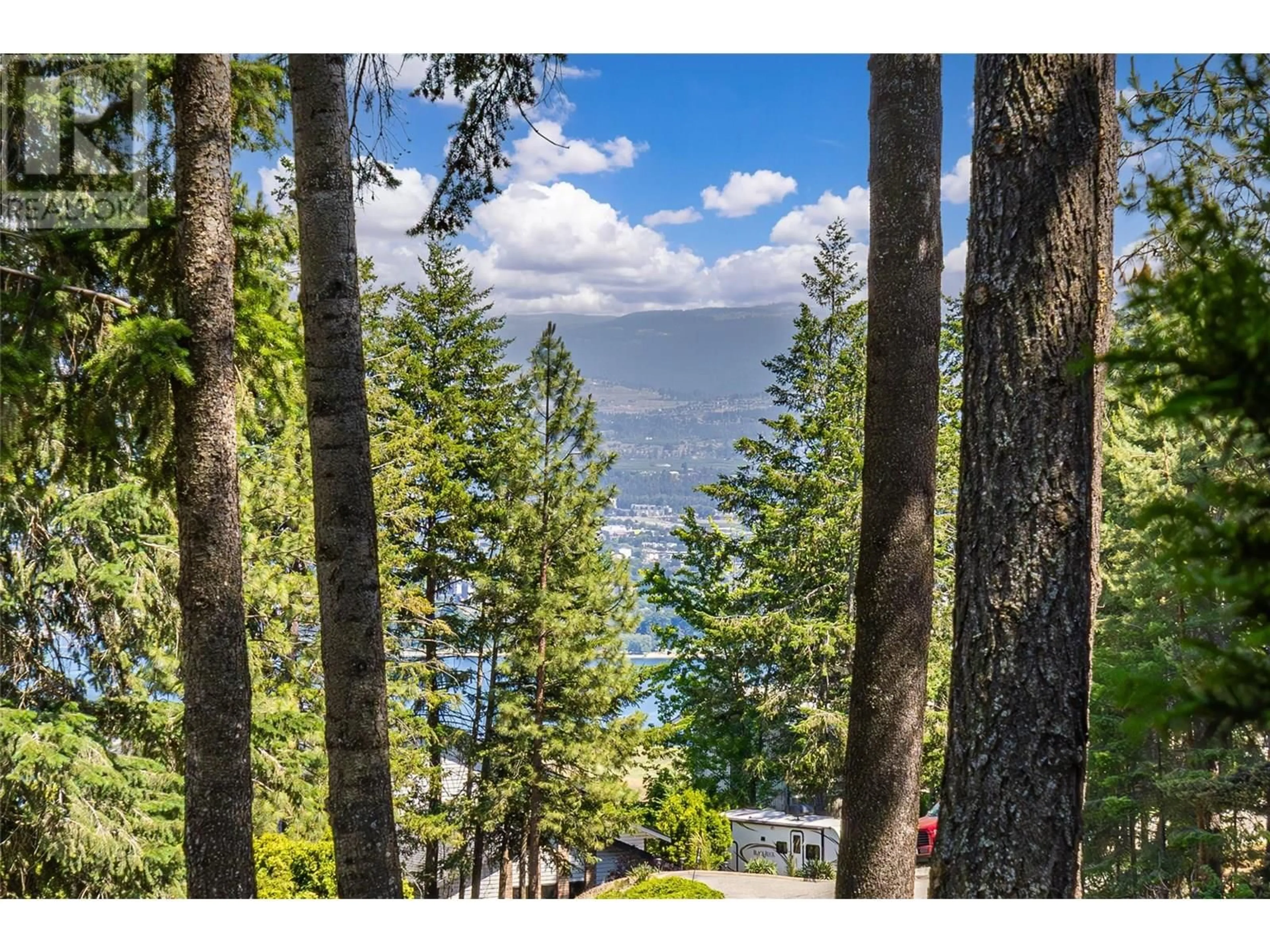 A pic from outside/outdoor area/front of a property/back of a property/a pic from drone, water/lake/river/ocean view for 1584 PARKINSON ROAD, West Kelowna British Columbia V1Z2X2