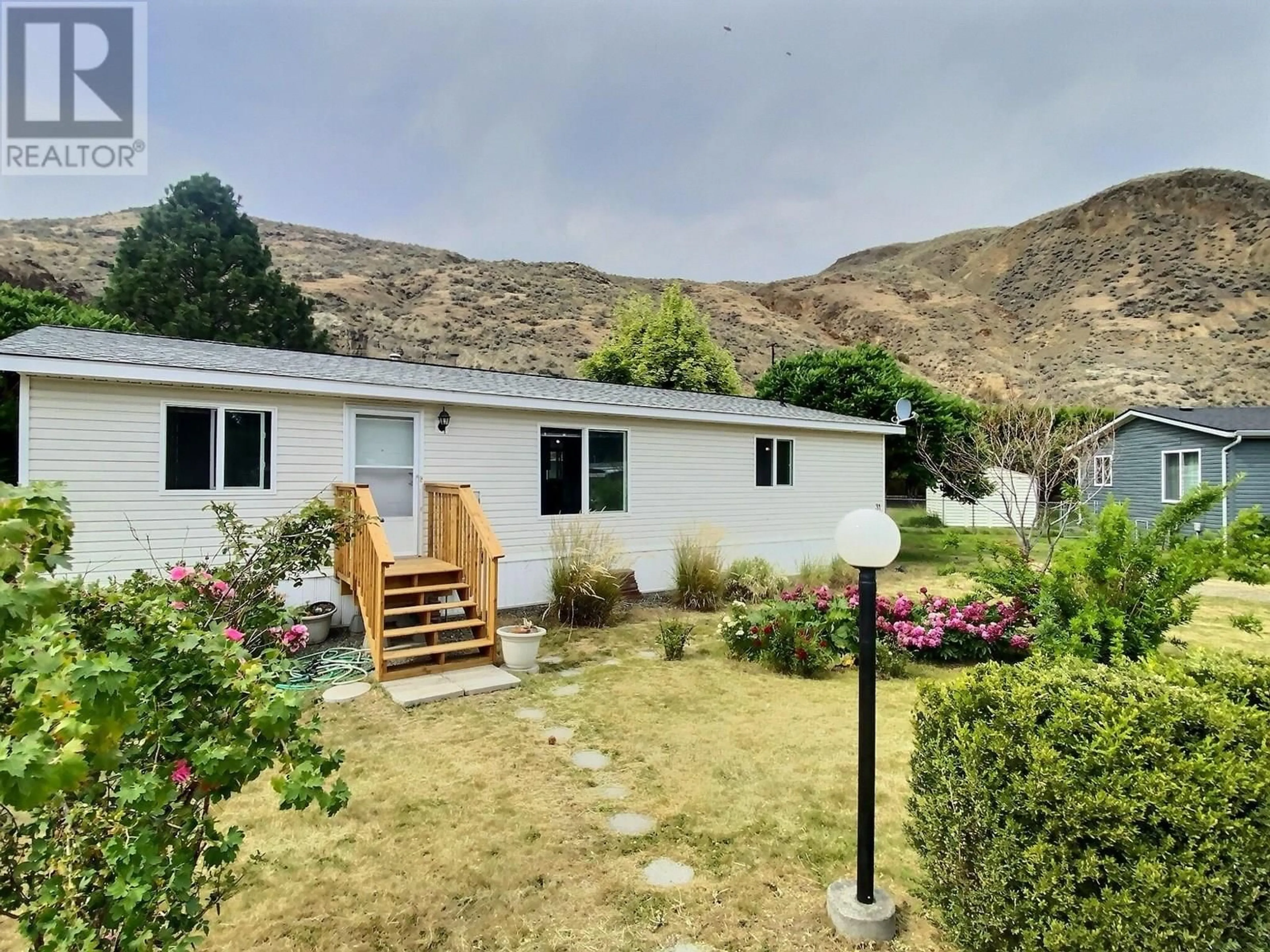 A pic from outside/outdoor area/front of a property/back of a property/a pic from drone, mountain view for 31 - 2401 ORD ROAD, Kamloops British Columbia V2B7V8