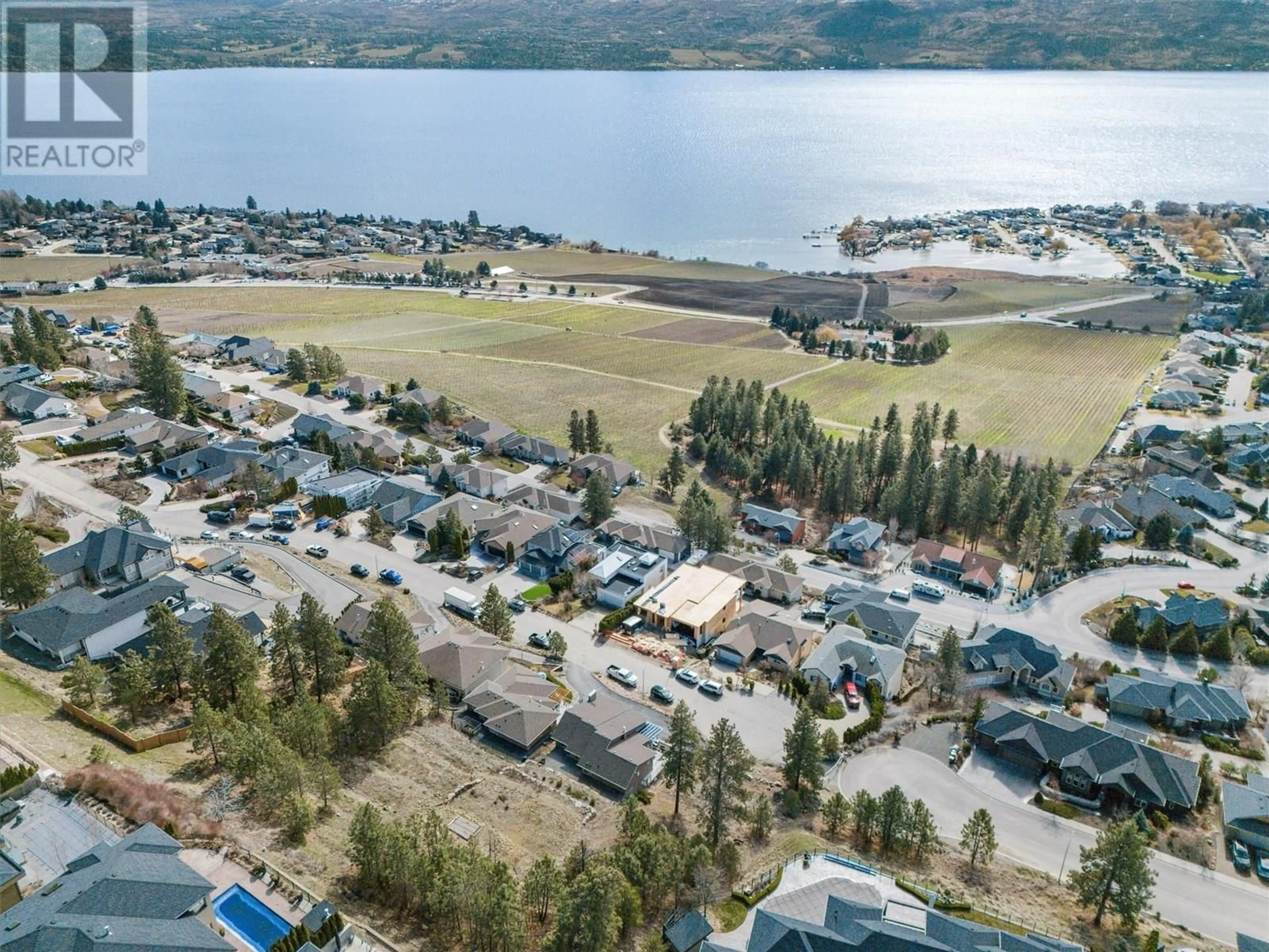 A pic from outside/outdoor area/front of a property/back of a property/a pic from drone, water/lake/river/ocean view for 1430 MENU ROAD, West Kelowna British Columbia V4T2R9