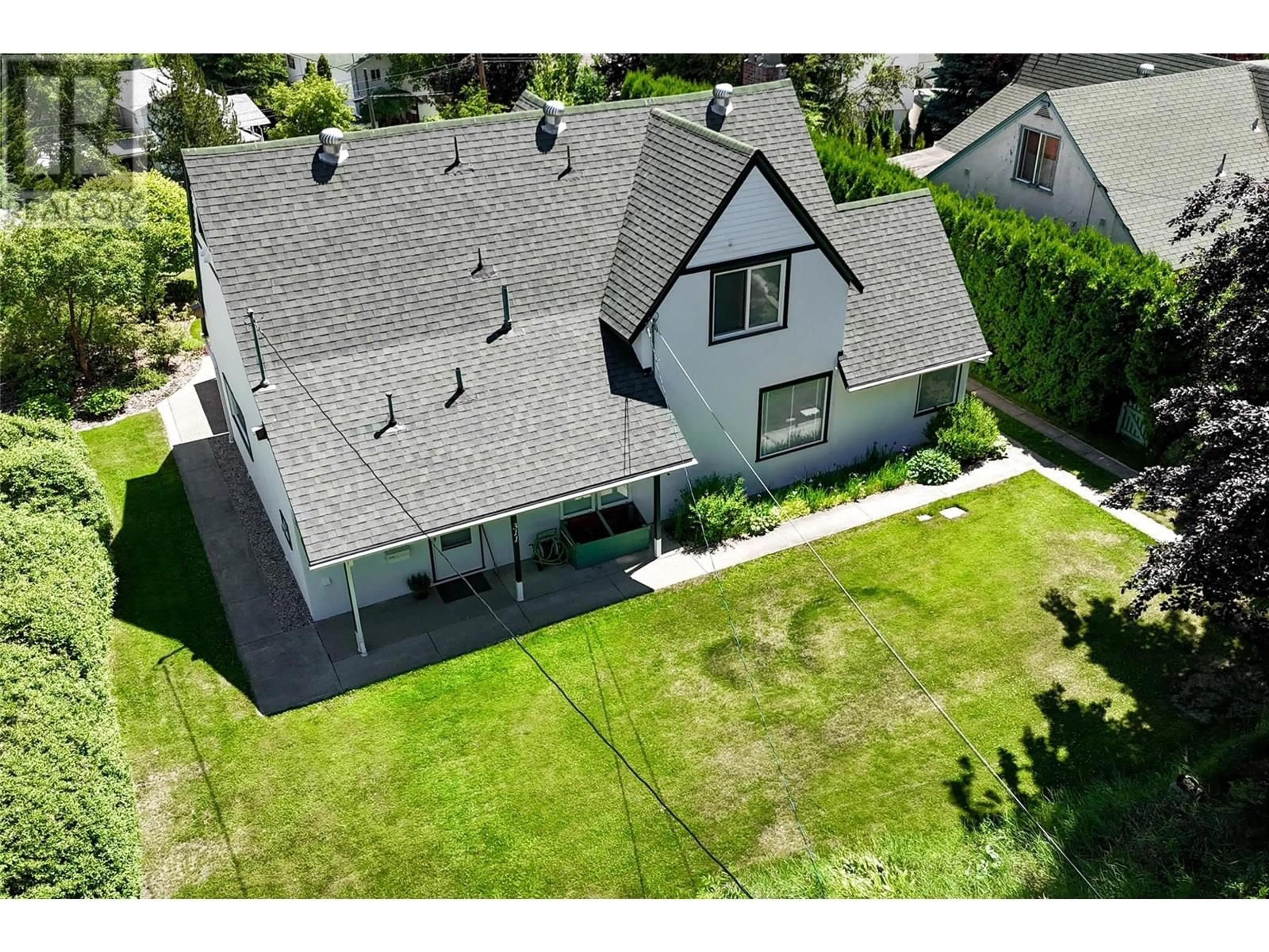 A pic from outside/outdoor area/front of a property/back of a property/a pic from drone, street for 311 MURRAY DRIVE, Warfield British Columbia V1R2J5