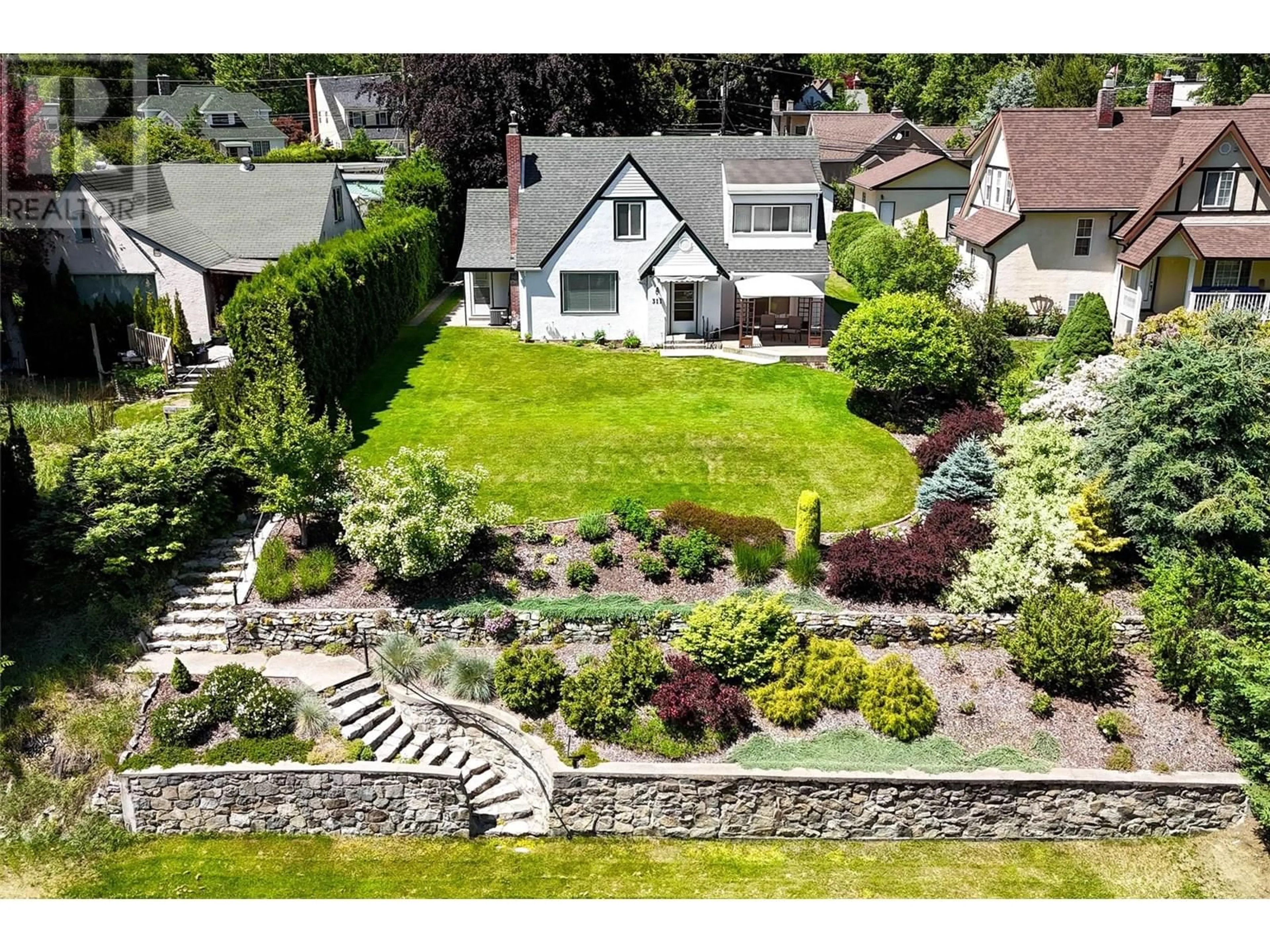 A pic from outside/outdoor area/front of a property/back of a property/a pic from drone, street for 311 MURRAY DRIVE, Warfield British Columbia V1R2J5