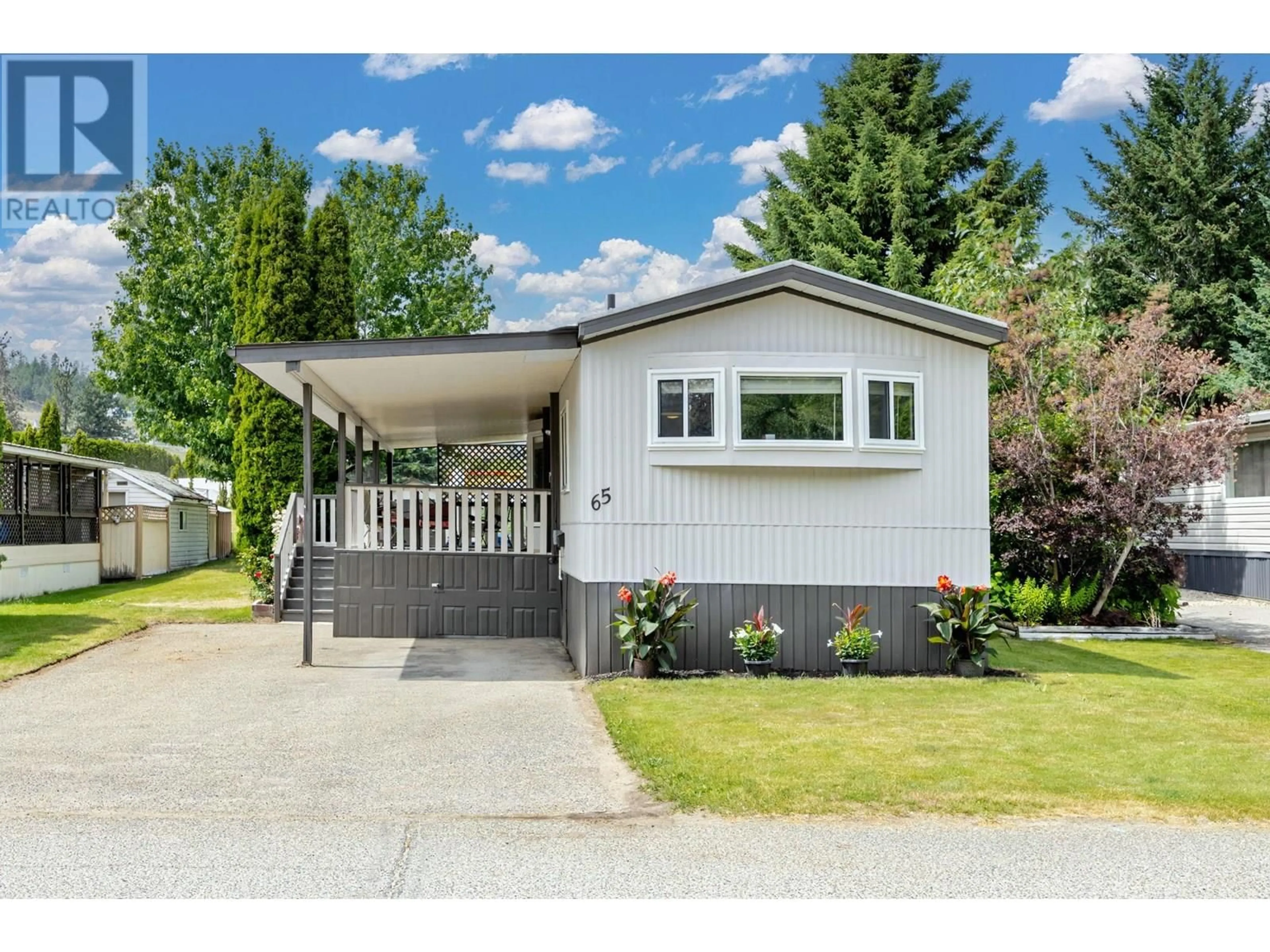 Home with vinyl exterior material, street for 65 - 1929 HIGHWAY 97 HIGHWAY SOUTH, West Kelowna British Columbia V1Z2Z1