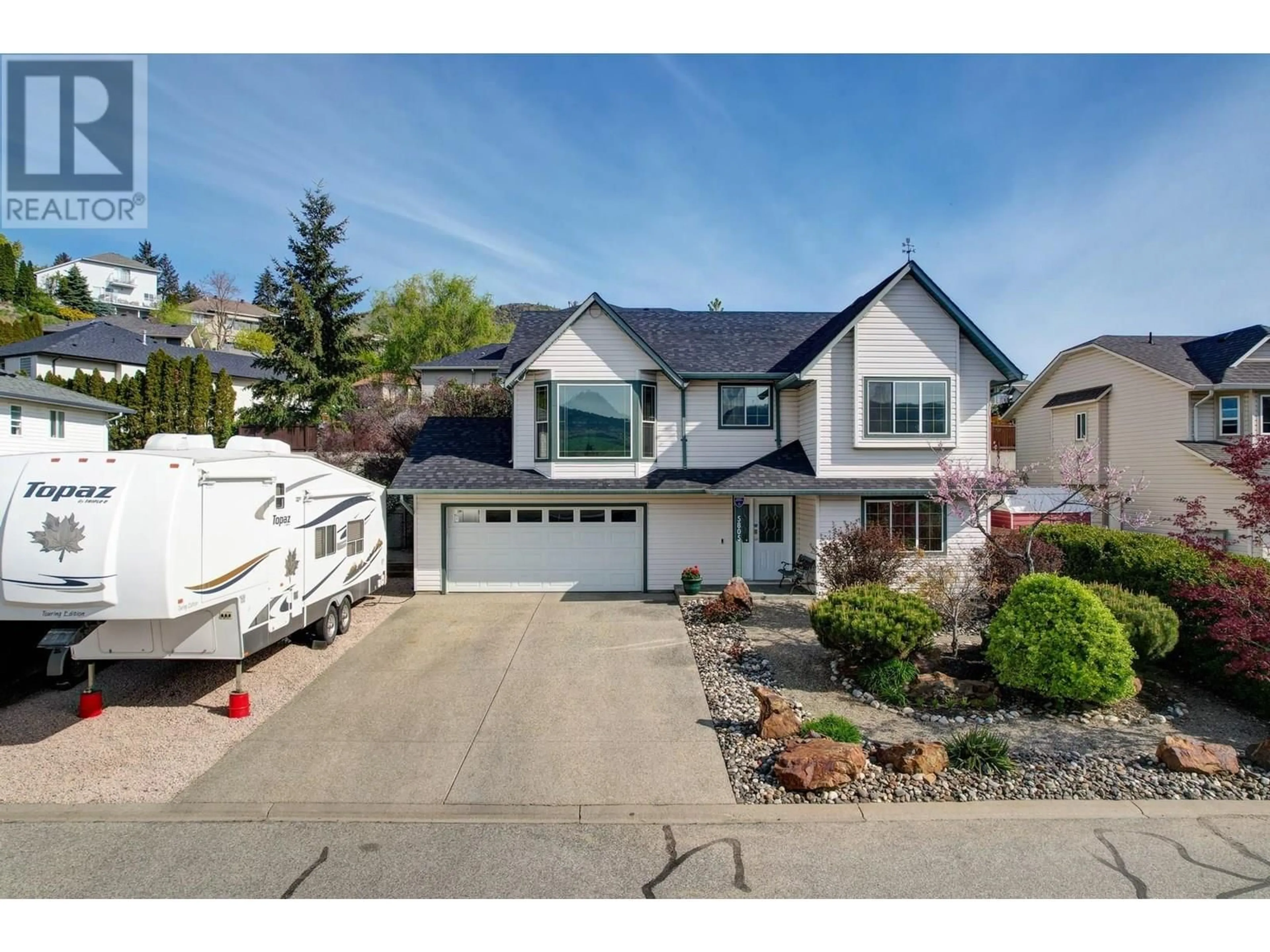 Home with vinyl exterior material, street for 5805 RICHFIELD DRIVE, Vernon British Columbia V1H1A7