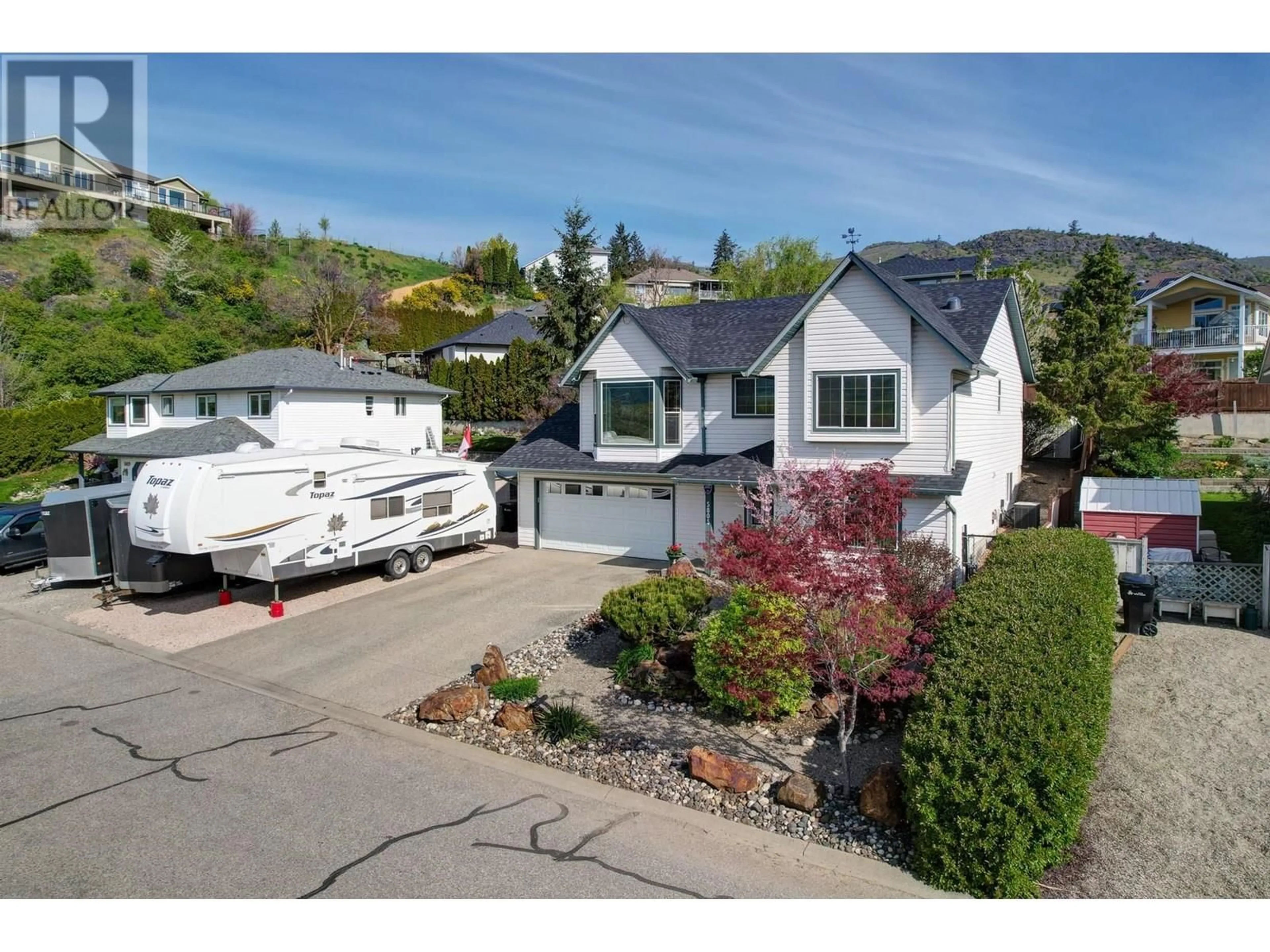 Home with vinyl exterior material, mountain view for 5805 RICHFIELD DRIVE, Vernon British Columbia V1H1A7