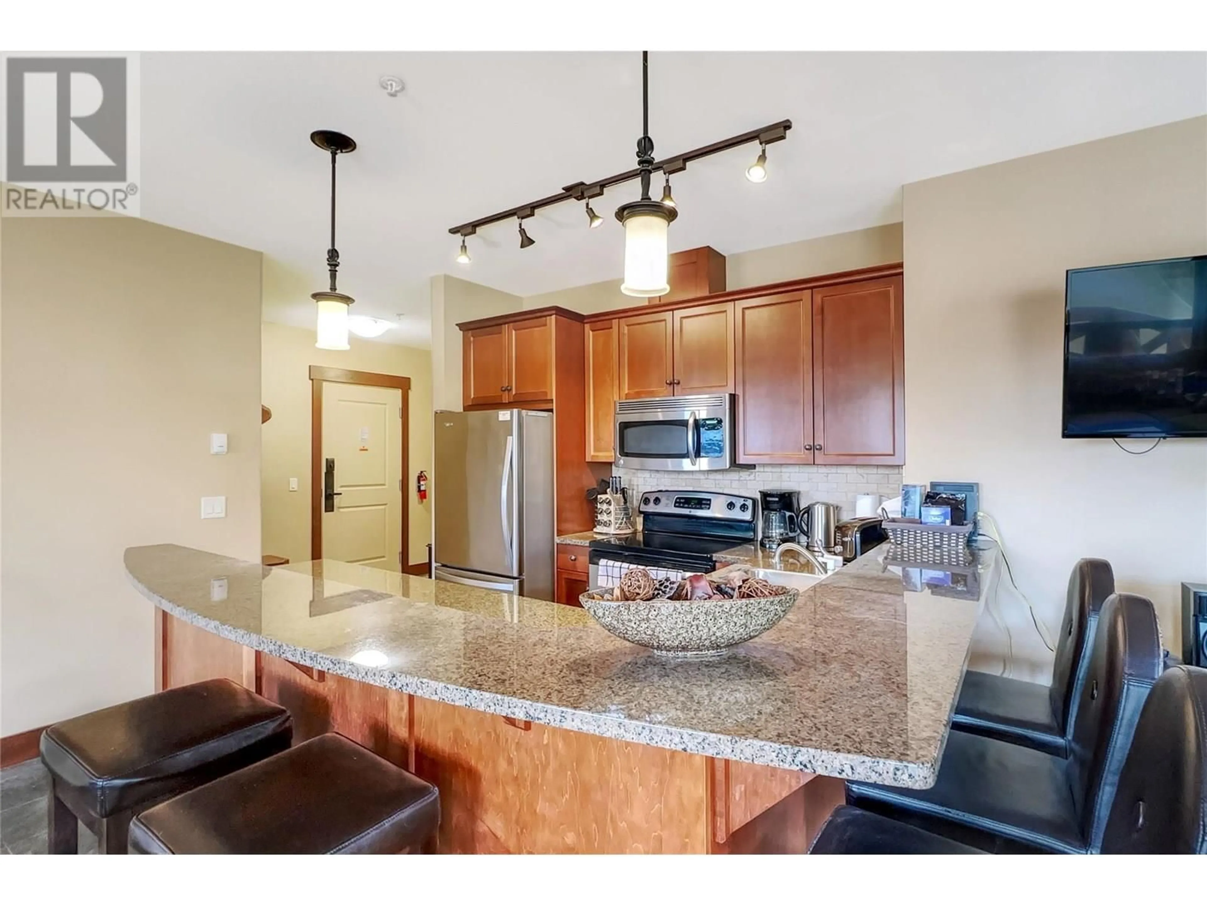 Open concept kitchen, ceramic/tile floor for 101C - 375 RAVEN RIDGE ROAD, Big White British Columbia V1P1P3