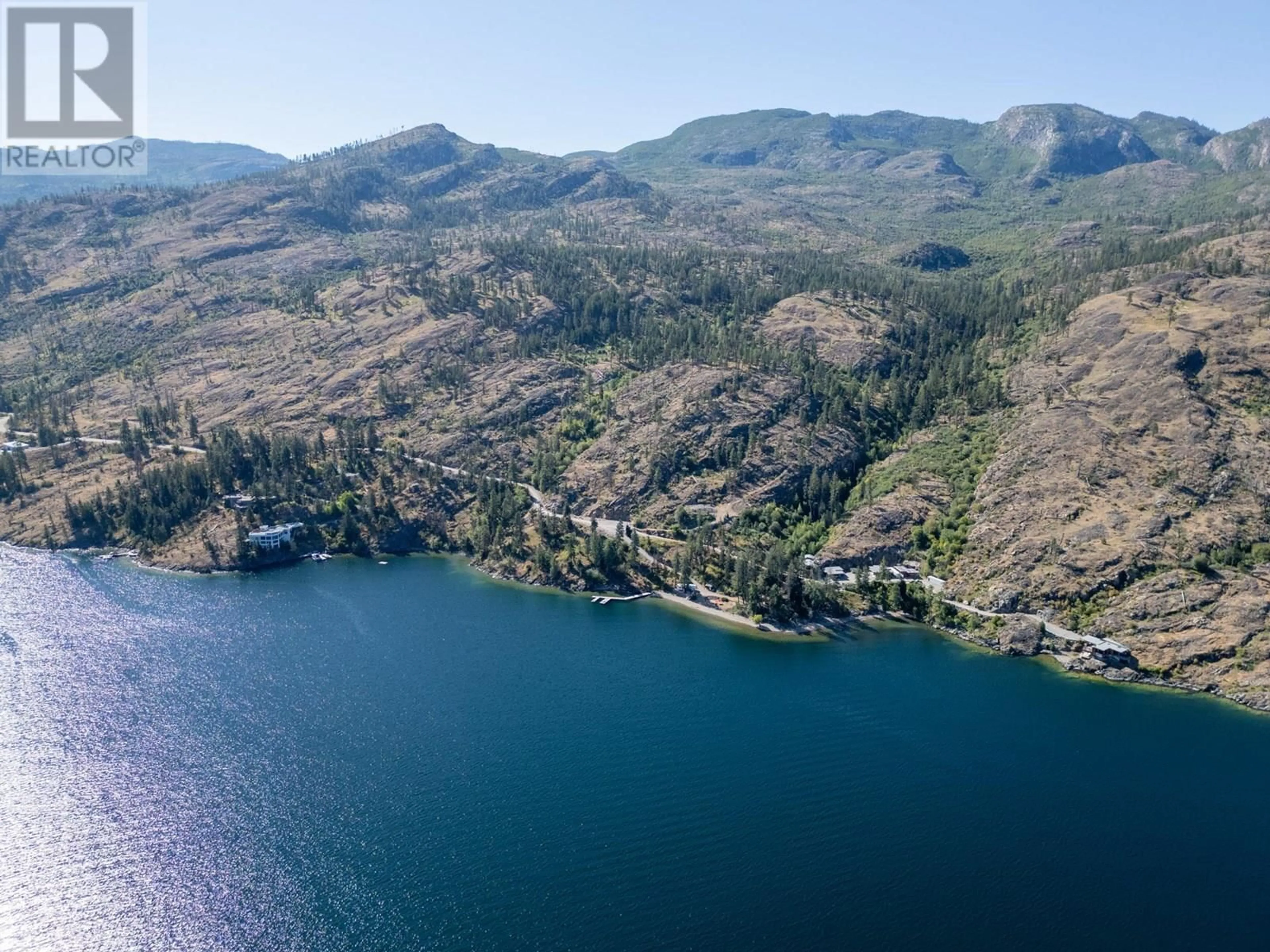 A pic from outside/outdoor area/front of a property/back of a property/a pic from drone, water/lake/river/ocean view for 8888 LAKESHORE ROAD, Kelowna British Columbia V1W4J5