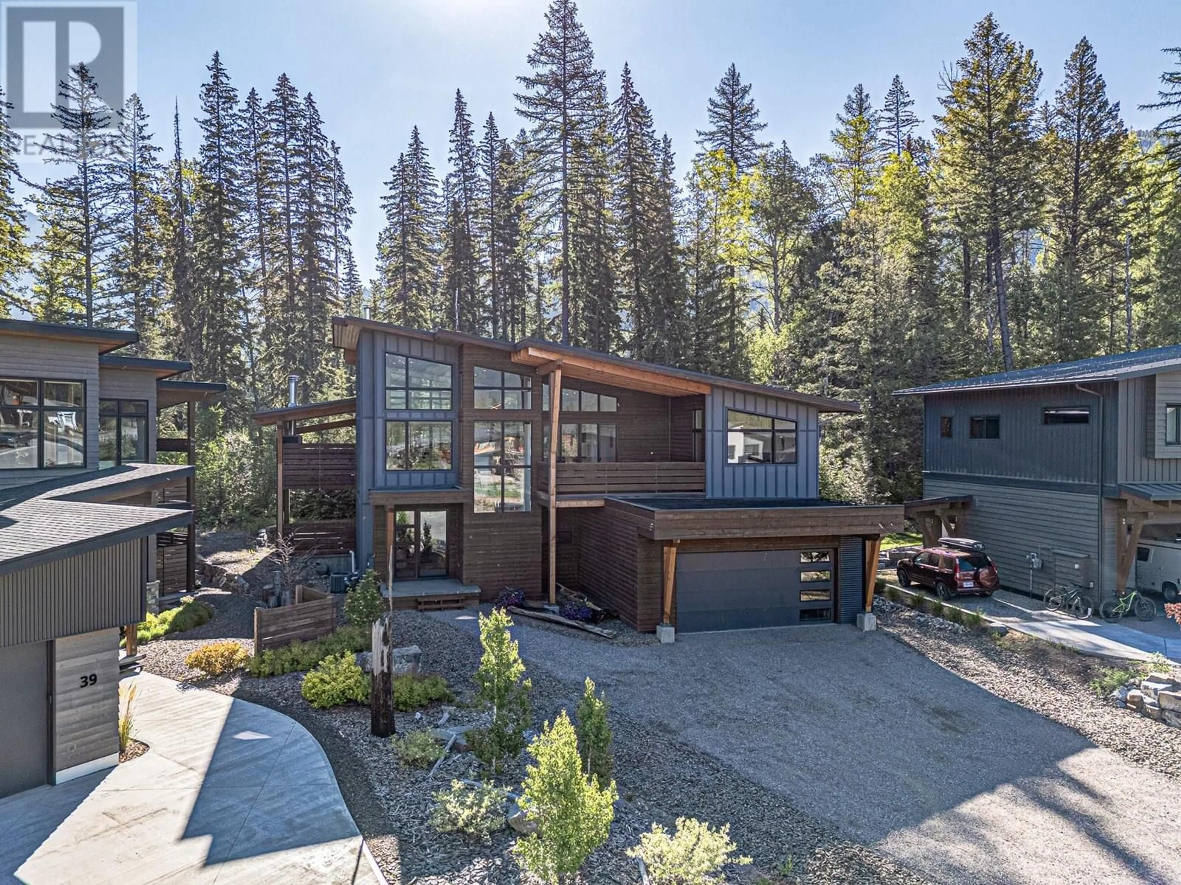 A pic from outside/outdoor area/front of a property/back of a property/a pic from drone, forest/trees view for 41 PIEDMONT DRIVE, Fernie British Columbia V0B1M4