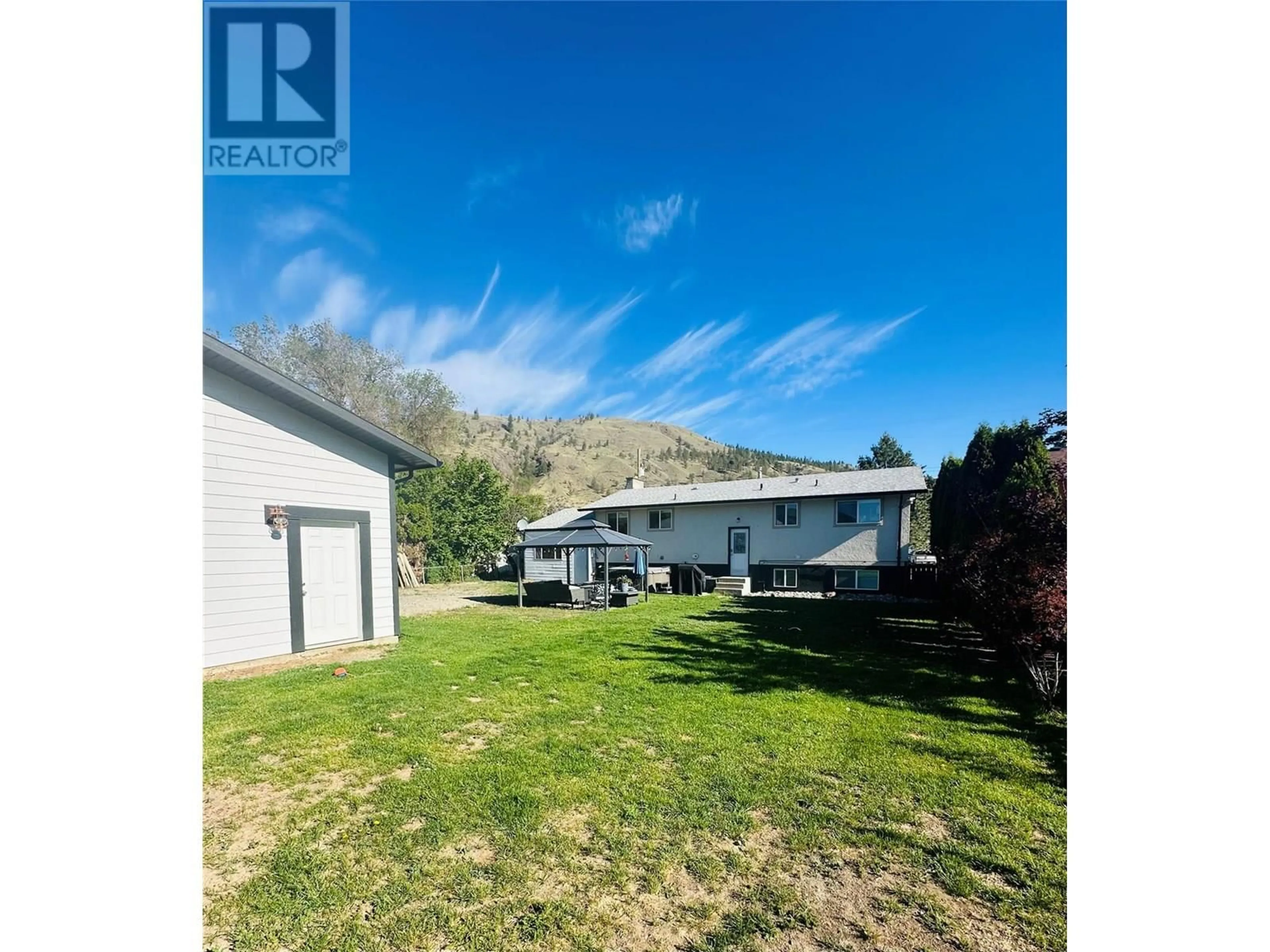 A pic from outside/outdoor area/front of a property/back of a property/a pic from drone, water/lake/river/ocean view for 879 DEVER DRIVE, Kamloops British Columbia V2B6P9