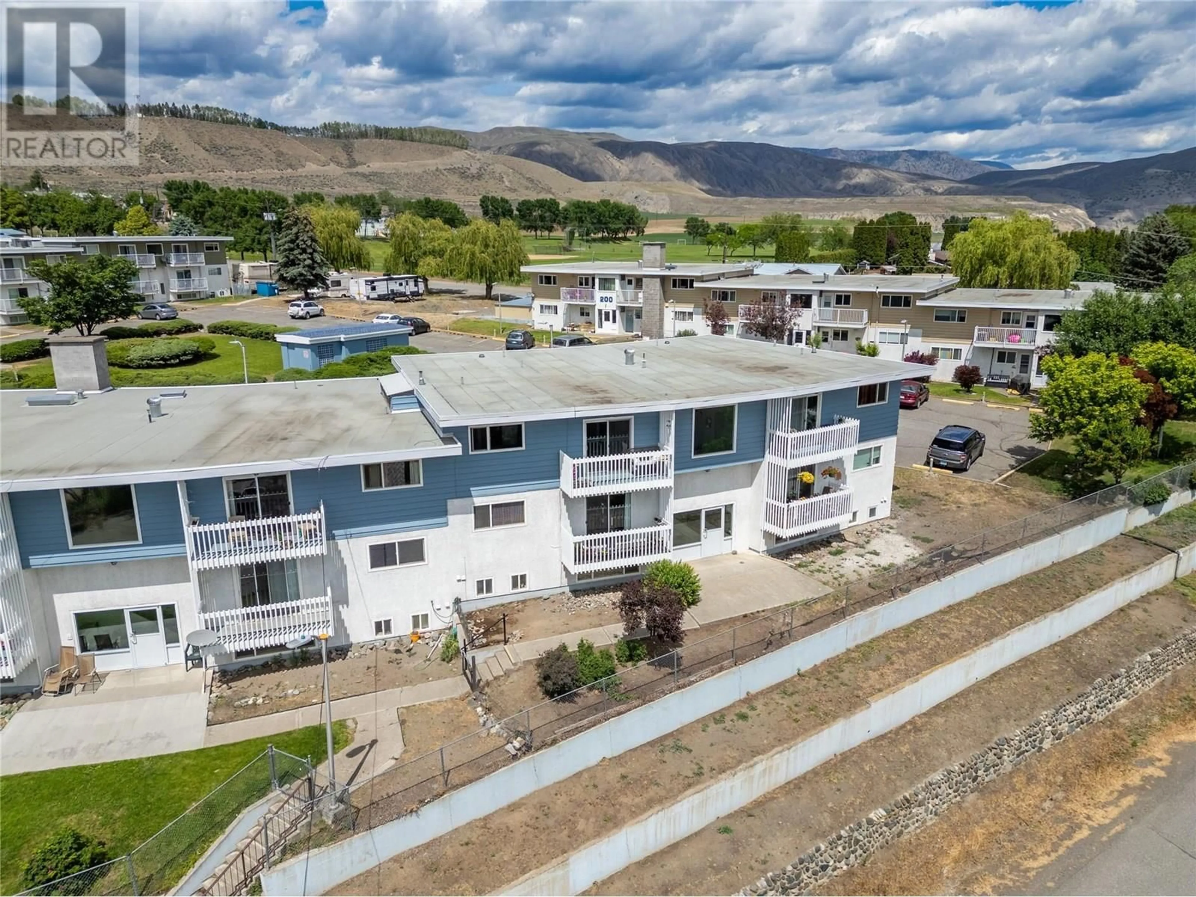 A pic from outside/outdoor area/front of a property/back of a property/a pic from drone, mountain view for 310 - 825 HILL STREET, Ashcroft British Columbia V0K1A0