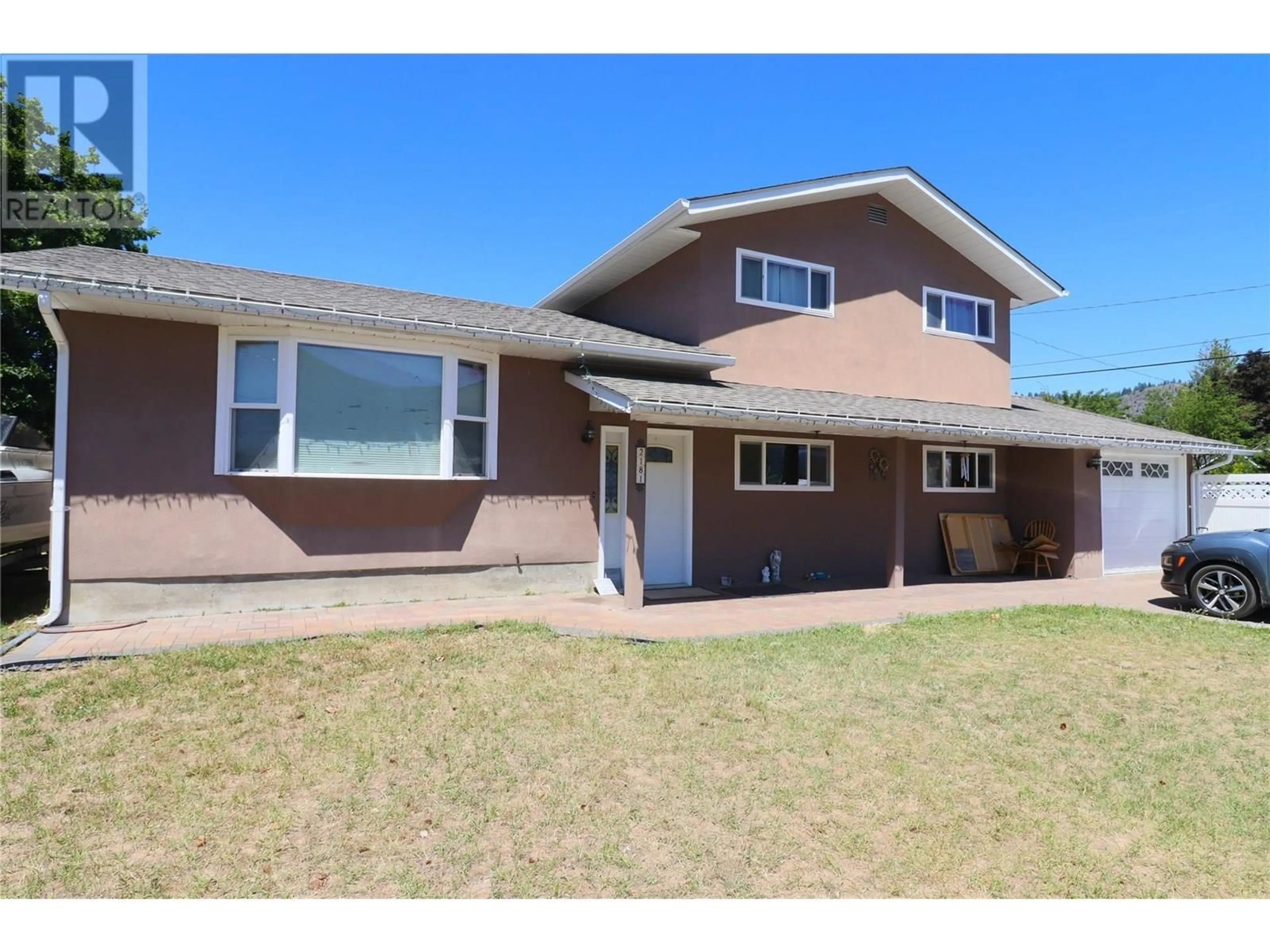 Home with vinyl exterior material, street for 2181 72ND AVENUE, Grand Forks British Columbia V0H1H0