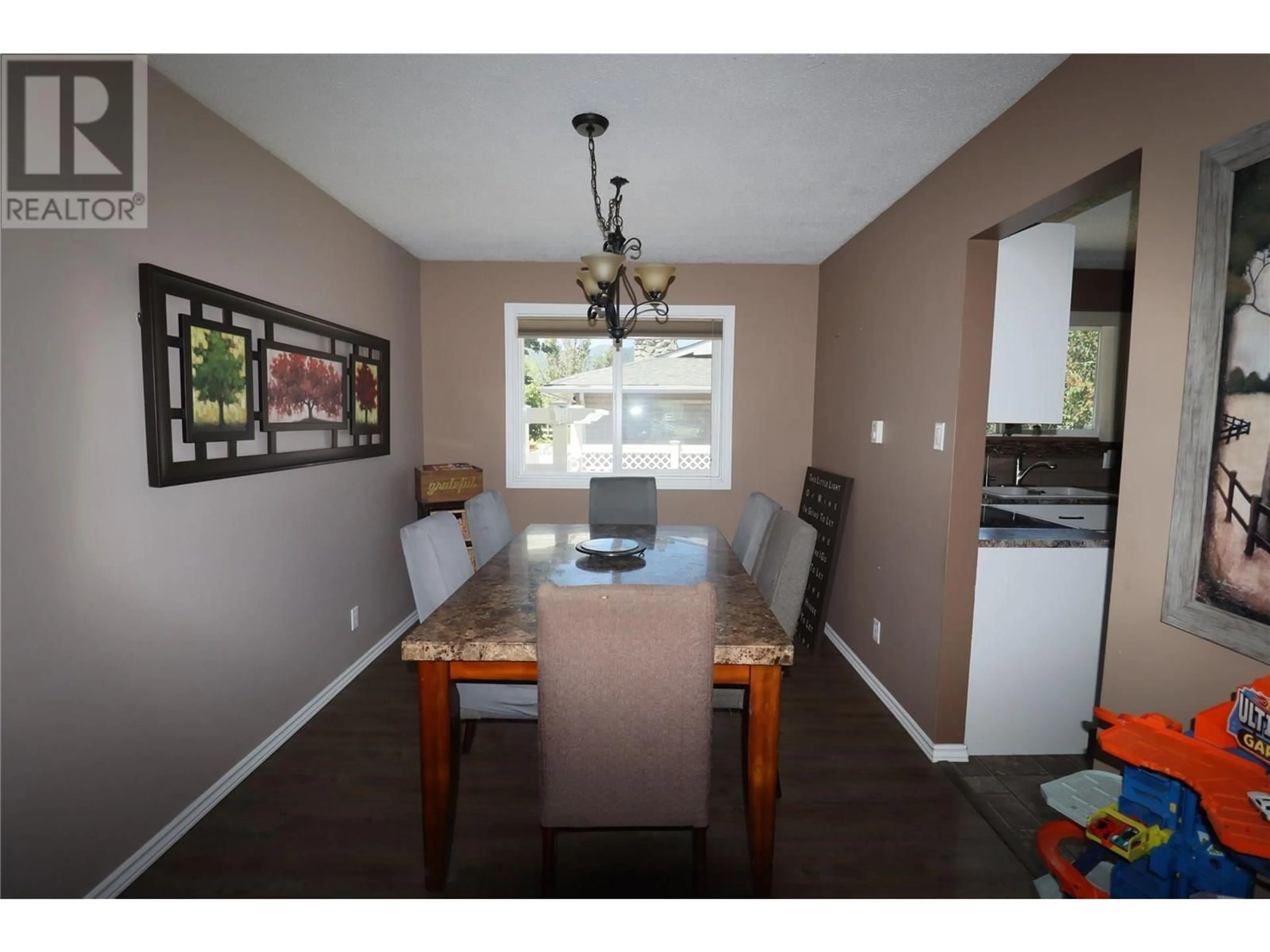 Dining room, wood/laminate floor for 2181 72ND AVENUE, Grand Forks British Columbia V0H1H0