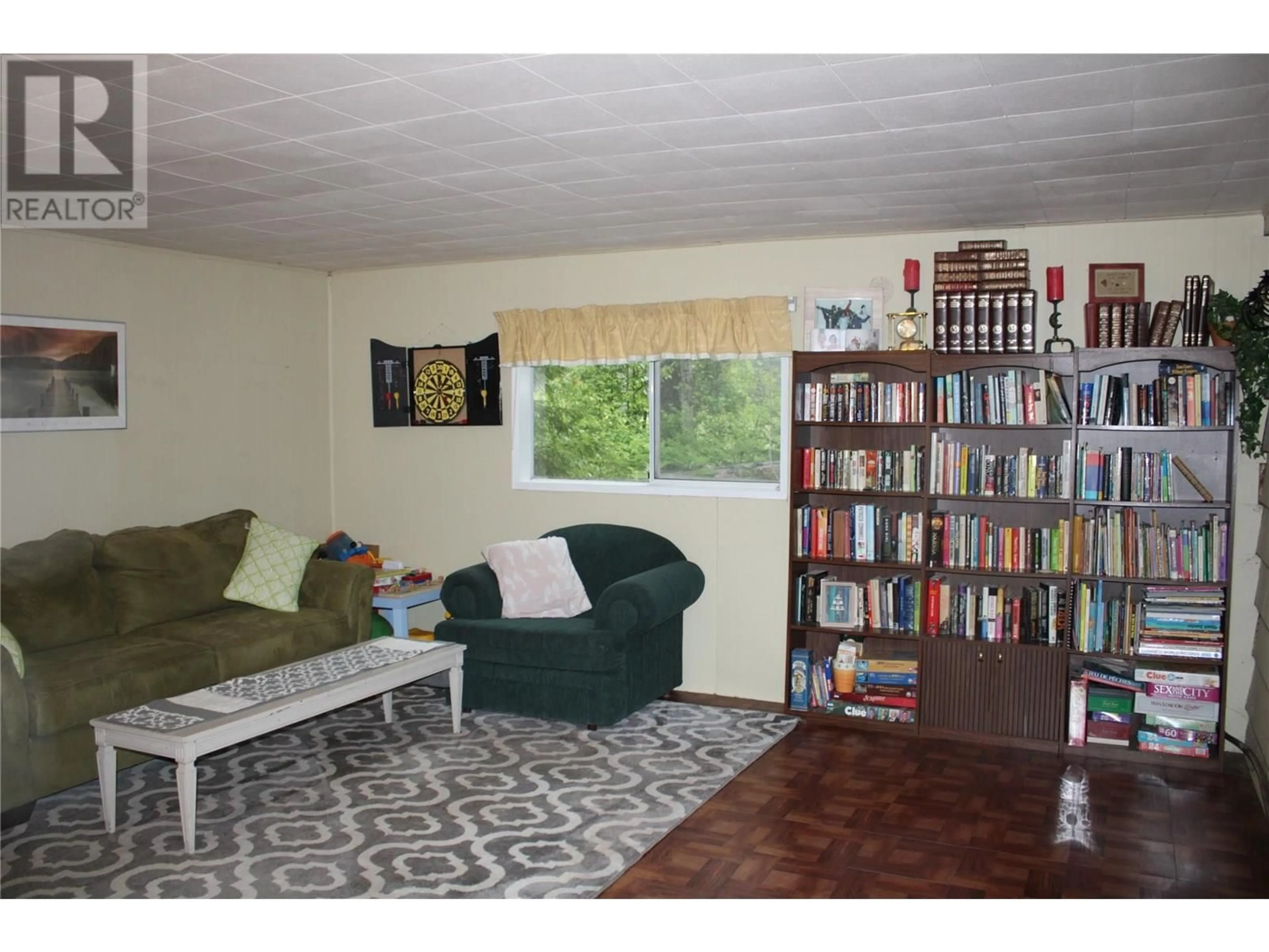 Living room with furniture, wood/laminate floor for 1281 HOSKINS ROAD, Seymour Arm British Columbia V0E2V2