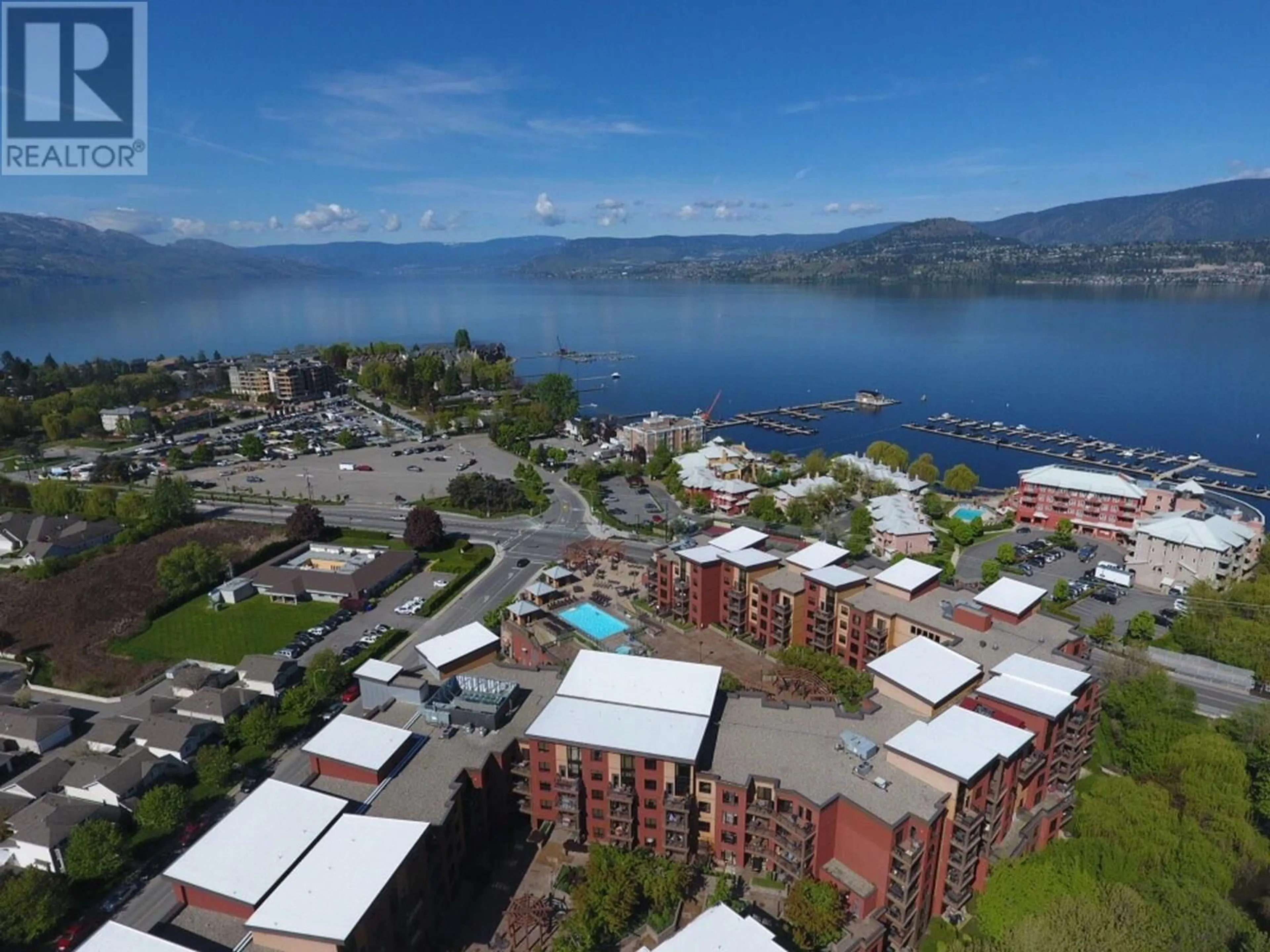 A pic from outside/outdoor area/front of a property/back of a property/a pic from drone, water/lake/river/ocean view for 412 - 654 COOK ROAD, Kelowna British Columbia V1W3G7