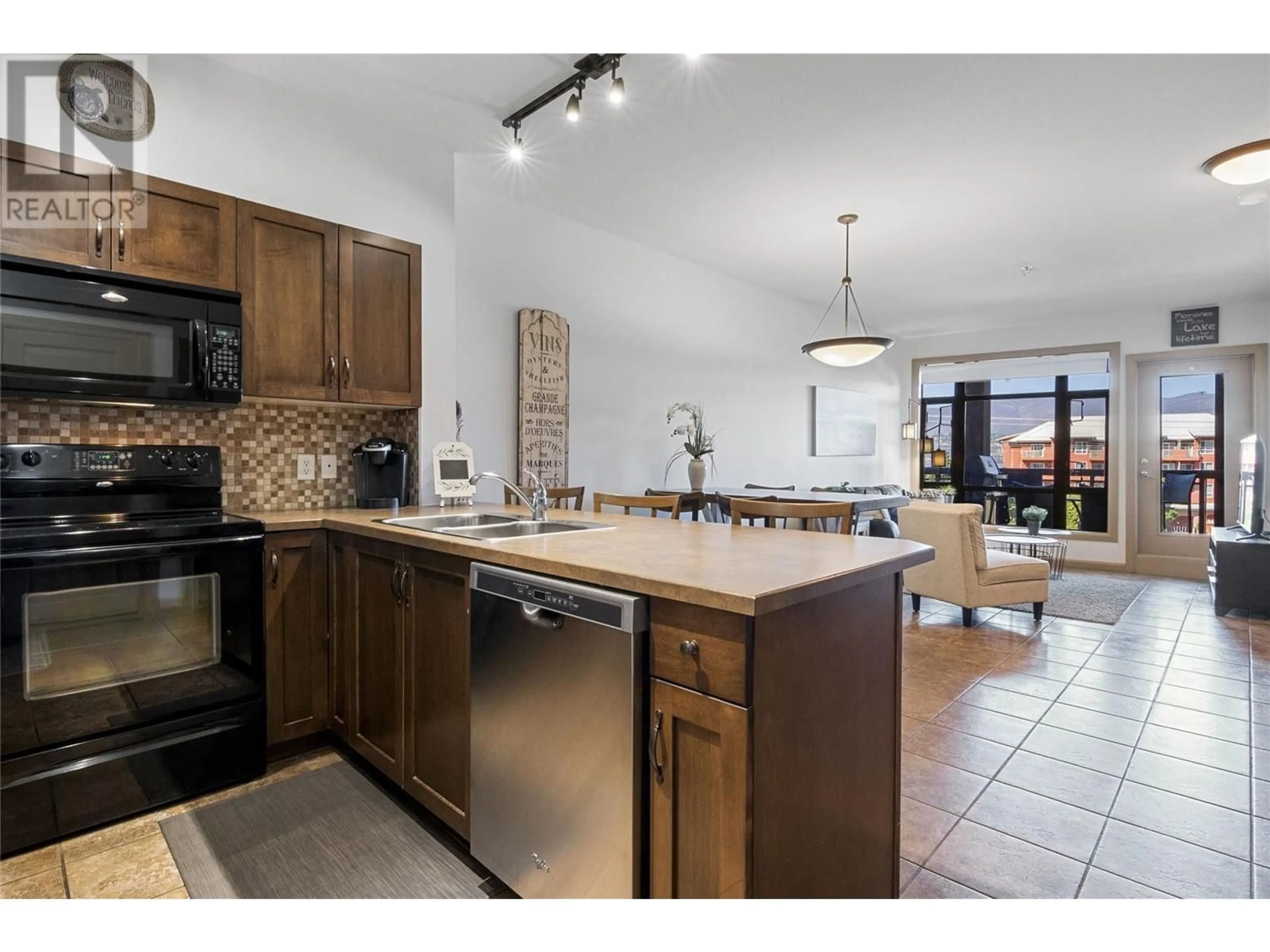 Open concept kitchen, ceramic/tile floor for 412 - 654 COOK ROAD, Kelowna British Columbia V1W3G7