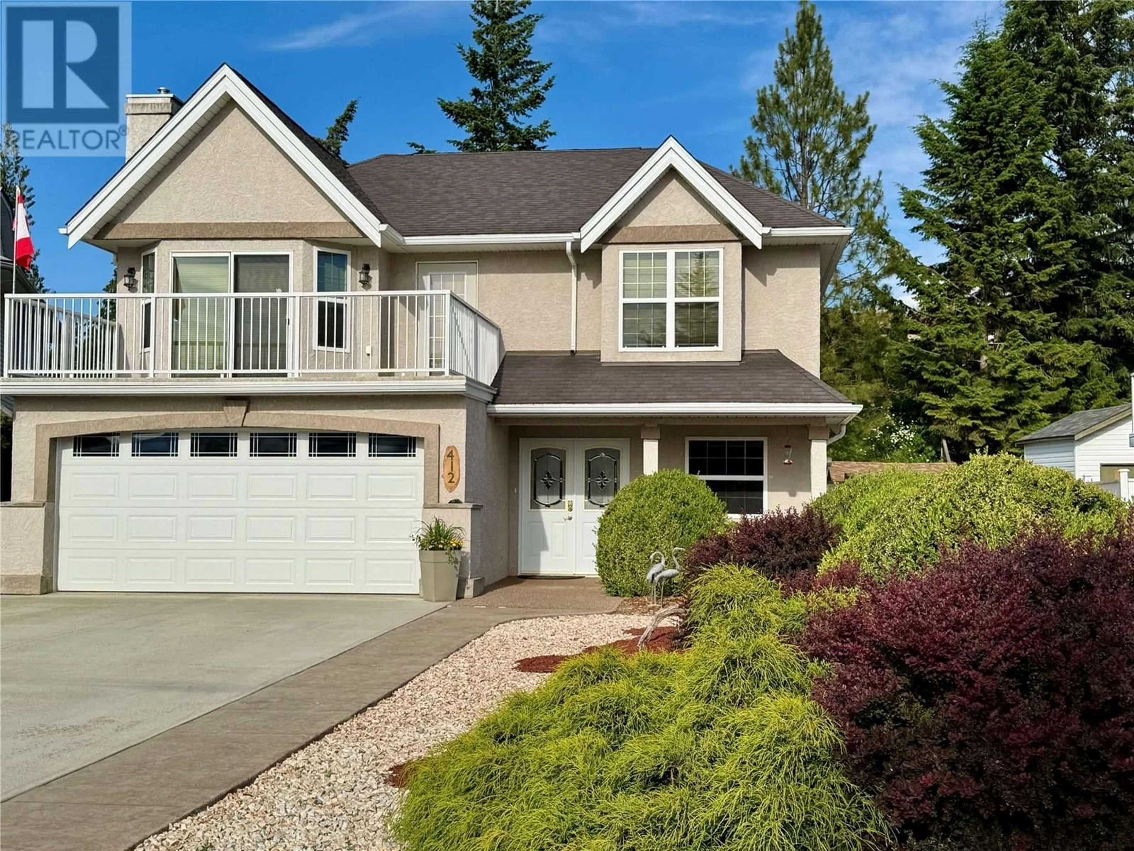Home with vinyl exterior material, street for 412 6TH AVENUE SOUTH, Creston British Columbia V0B1G3