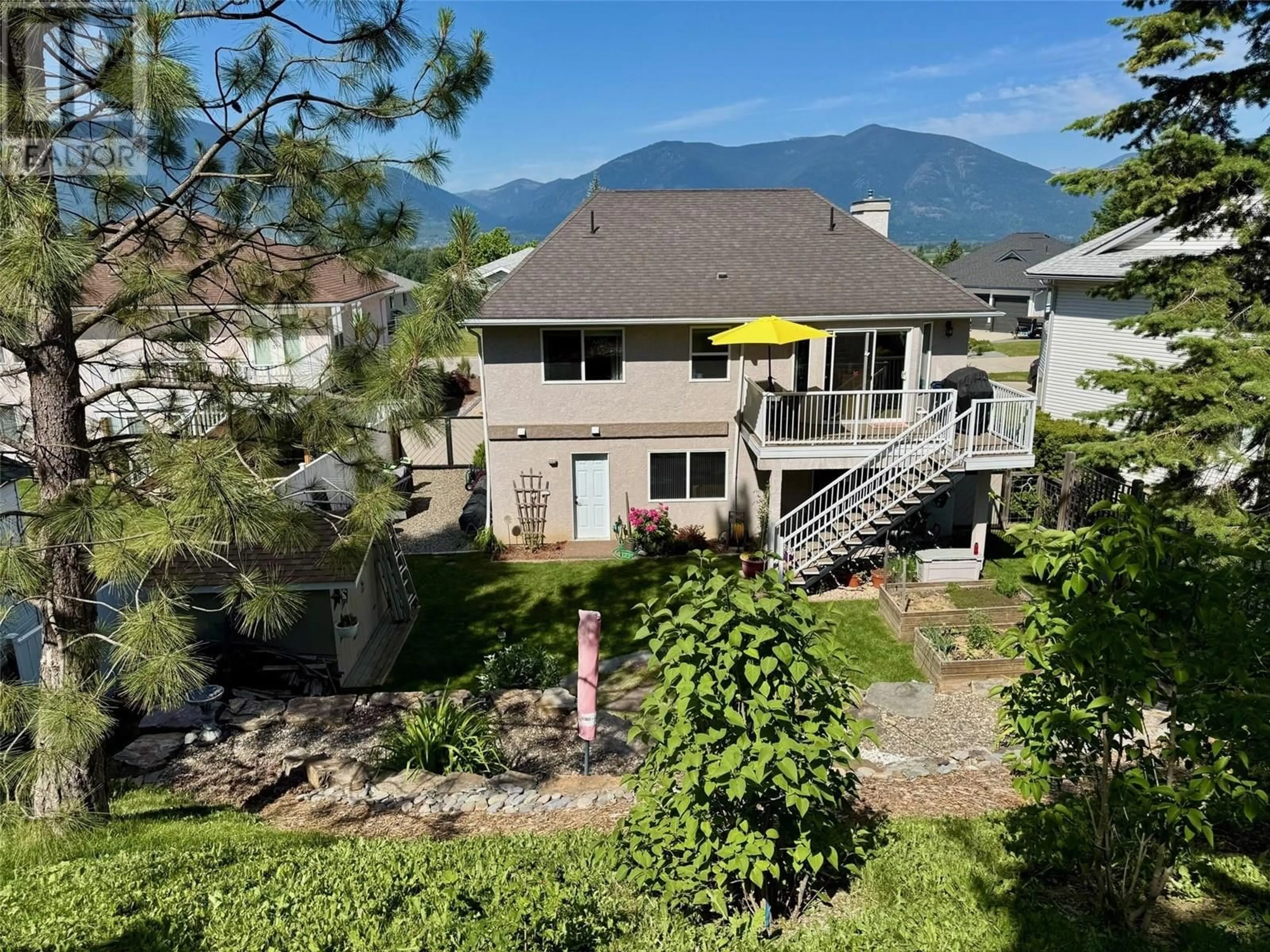 A pic from outside/outdoor area/front of a property/back of a property/a pic from drone, mountain view for 412 6TH AVENUE SOUTH, Creston British Columbia V0B1G3