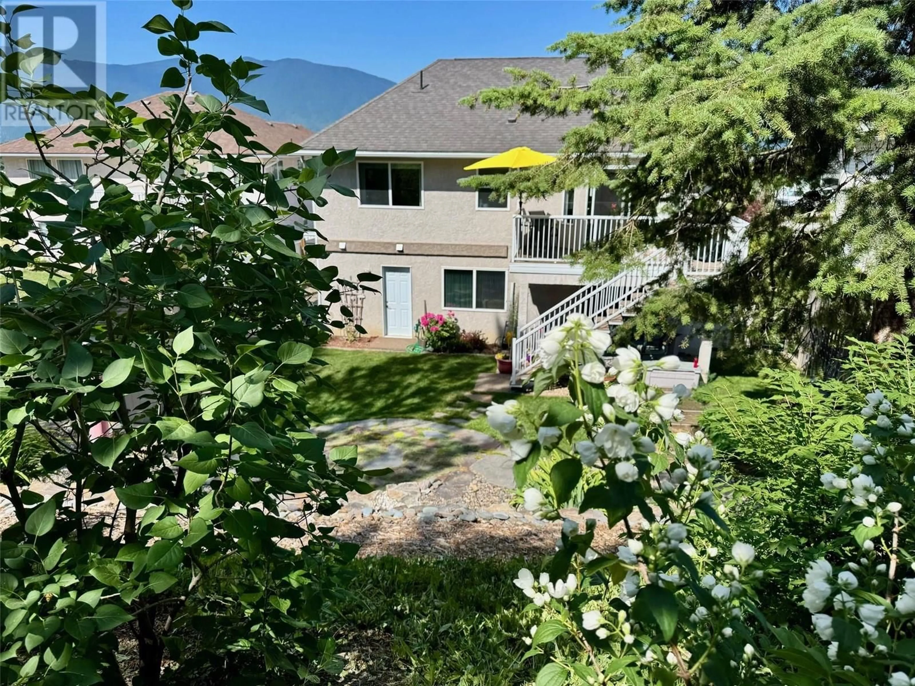 A pic from outside/outdoor area/front of a property/back of a property/a pic from drone, mountain view for 412 6TH AVENUE SOUTH, Creston British Columbia V0B1G3