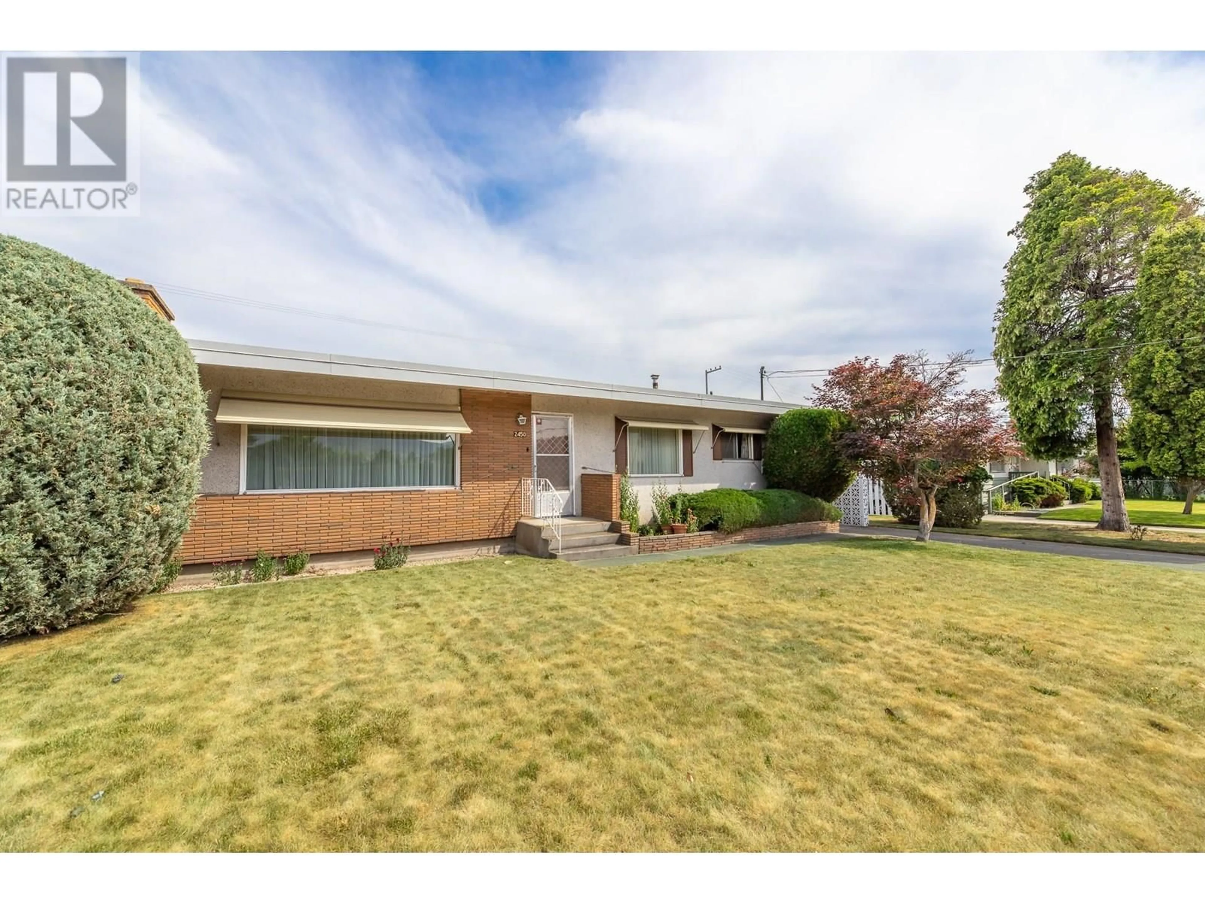 Home with brick exterior material, street for 2450 MCKENZIE STREET, Penticton British Columbia V2A6H7