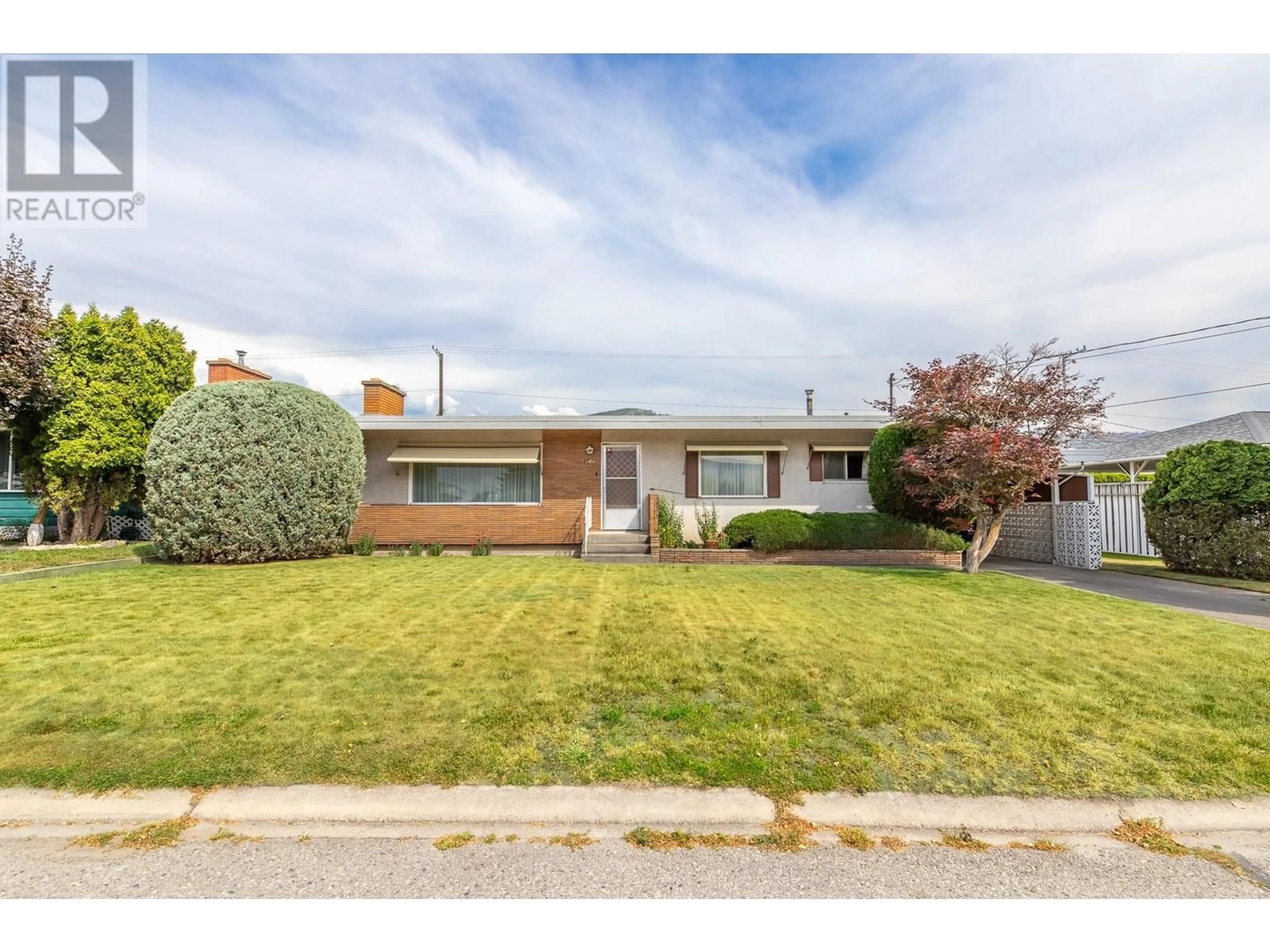 Home with brick exterior material, street for 2450 MCKENZIE STREET, Penticton British Columbia V2A6H7
