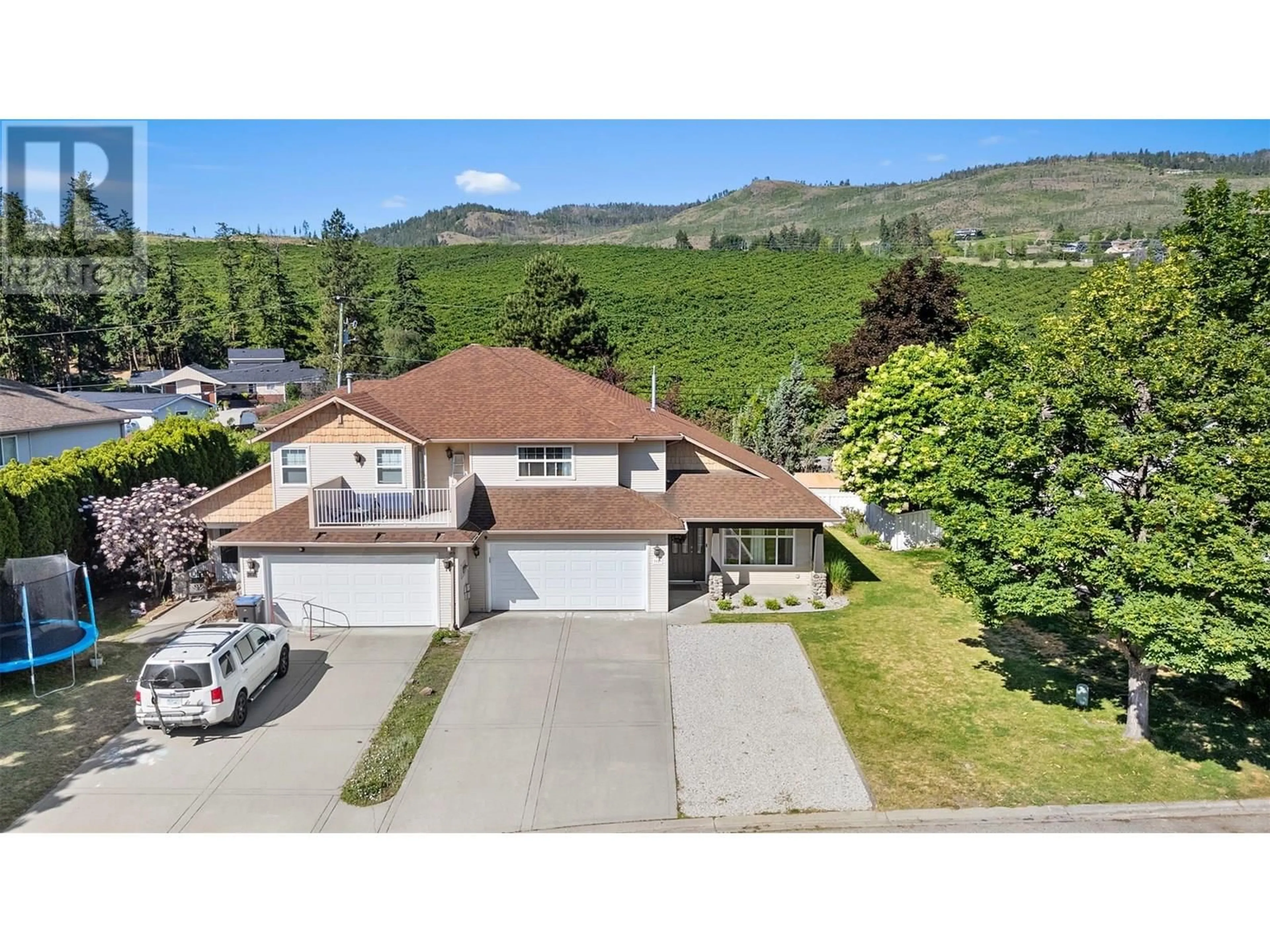 A pic from outside/outdoor area/front of a property/back of a property/a pic from drone, mountain view for 3828 GLEN CANYON DRIVE, West Kelowna British Columbia V4T2P7
