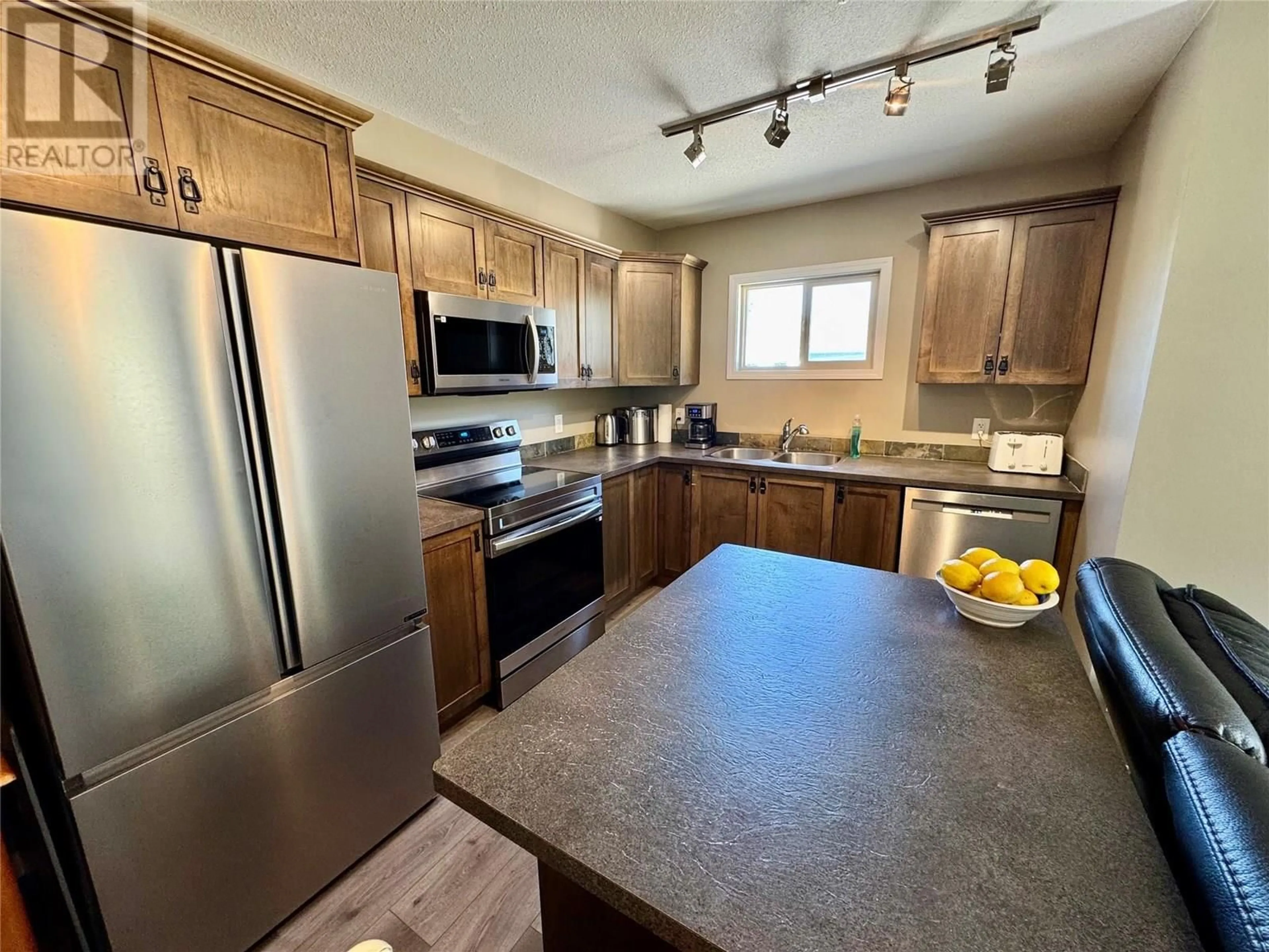 Open concept kitchen, unknown for 1301 - 4884 STANLEY STREET, Radium Hot Springs British Columbia V0A1M0