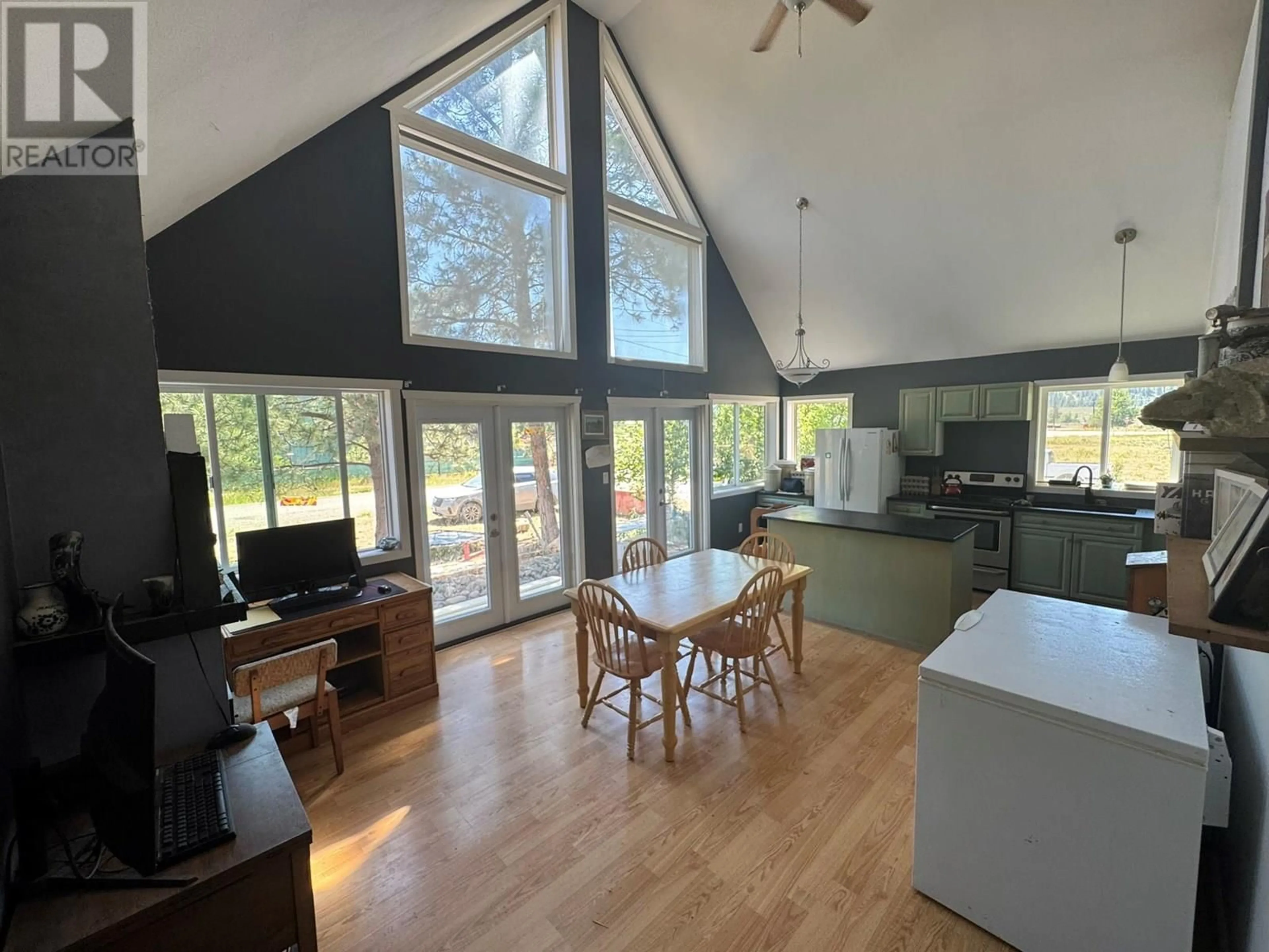 Open concept kitchen, wood/laminate floor for 242 CEMENT STREET, Princeton British Columbia V0X1W0